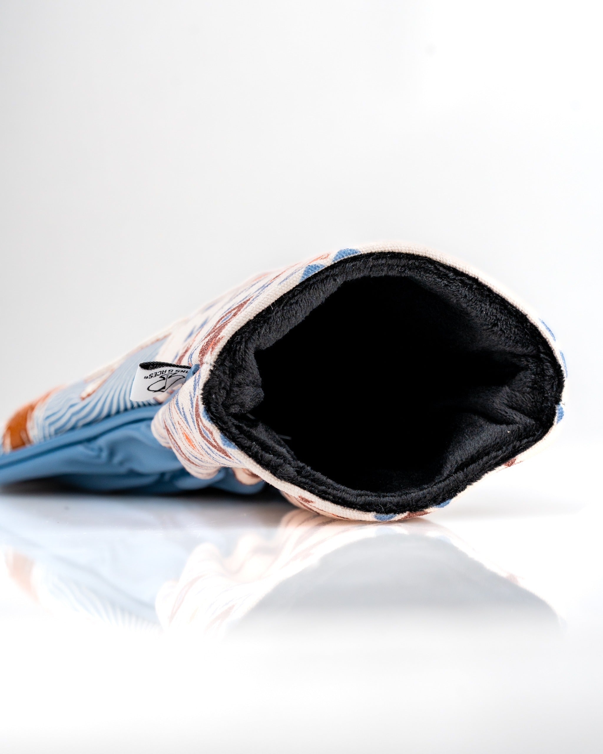 Western aesthetic driver cover featuring a colorful design with a soft interior for protection and style on the golf course.