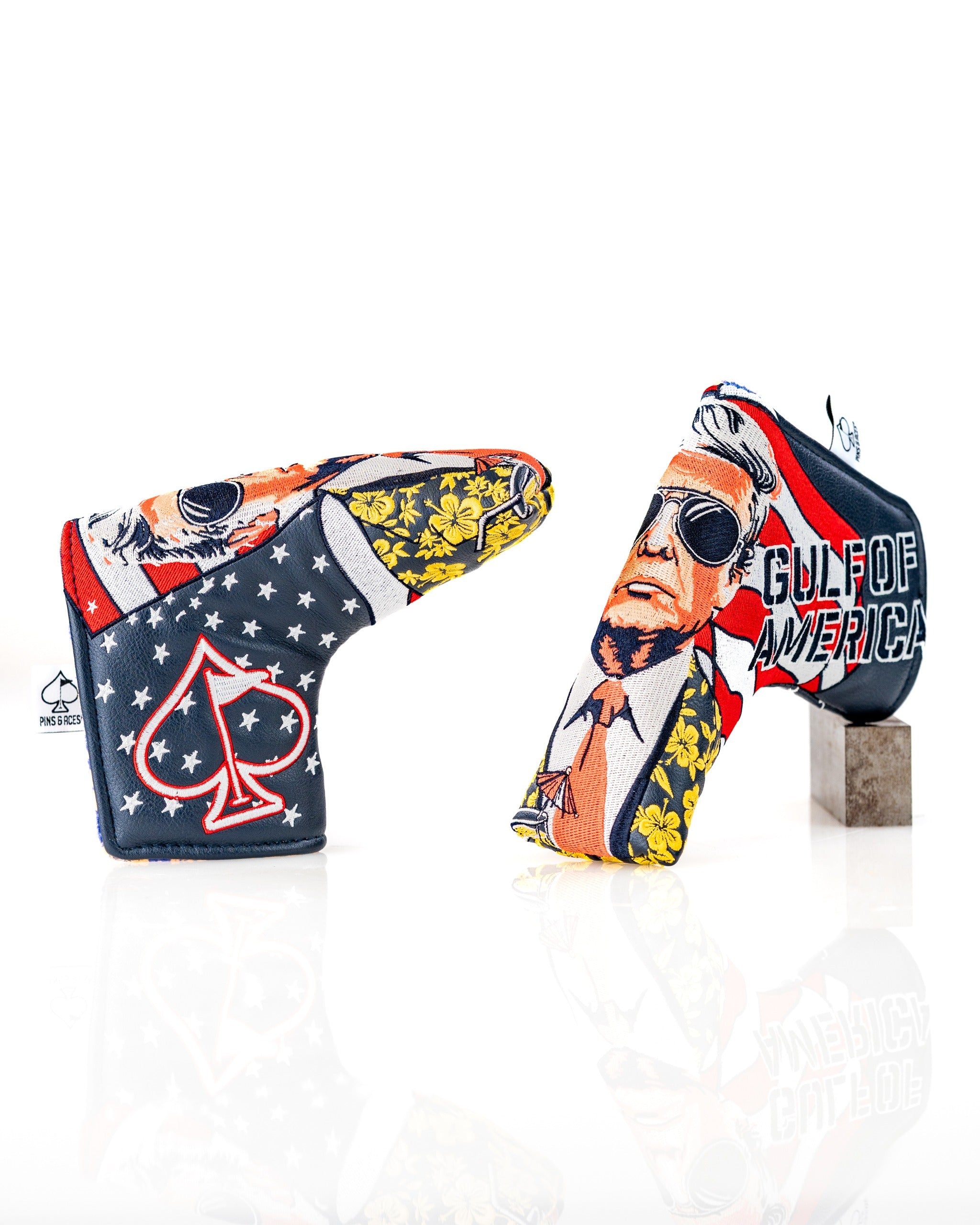 Bold golf blade cover featuring a patriotic design with vibrant colors, depicting a stylized figure and "Gulf of America" text.