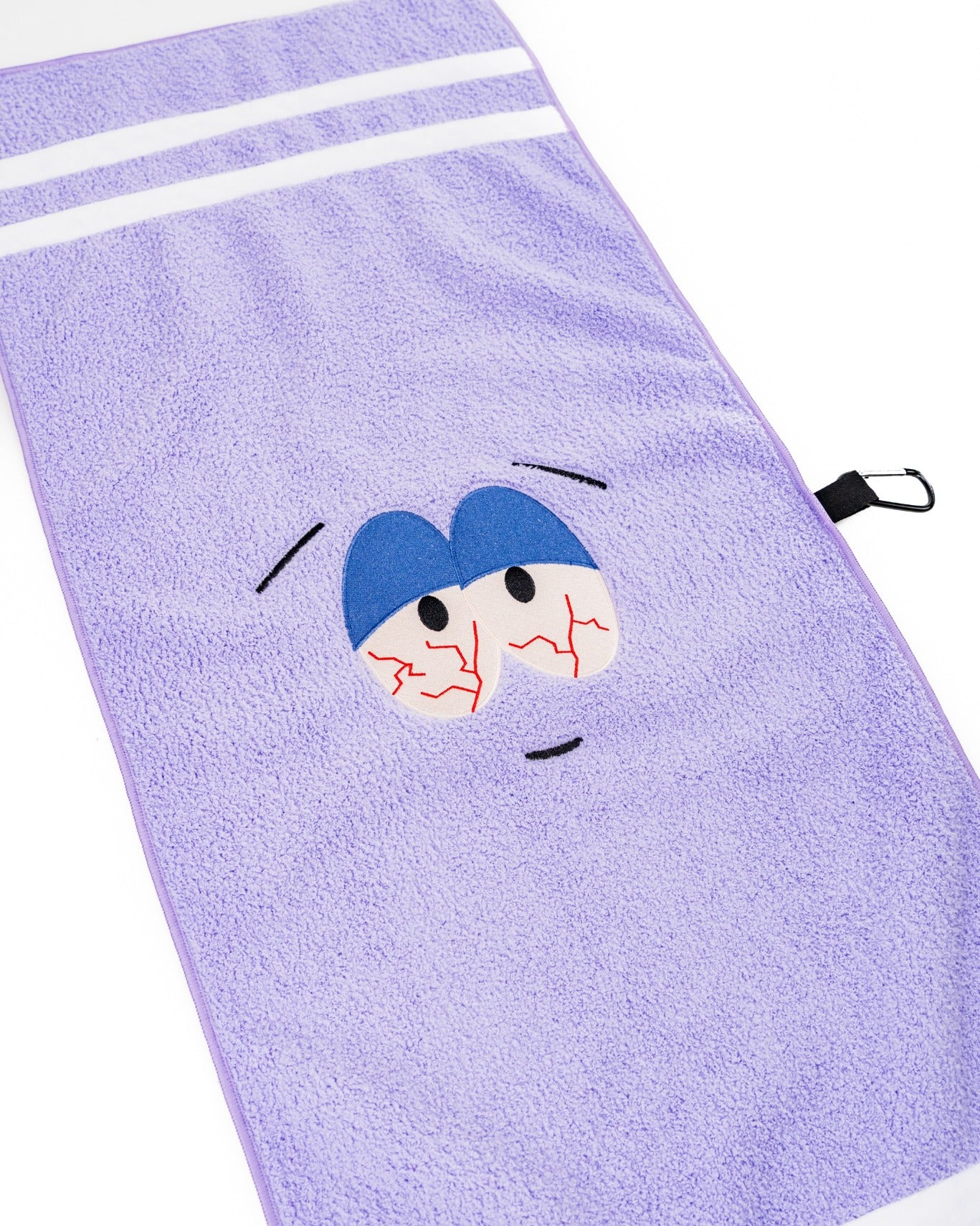 South Park Towelie towel featuring a purple design with a cartoon face and blue cap, ideal for fans of the show.