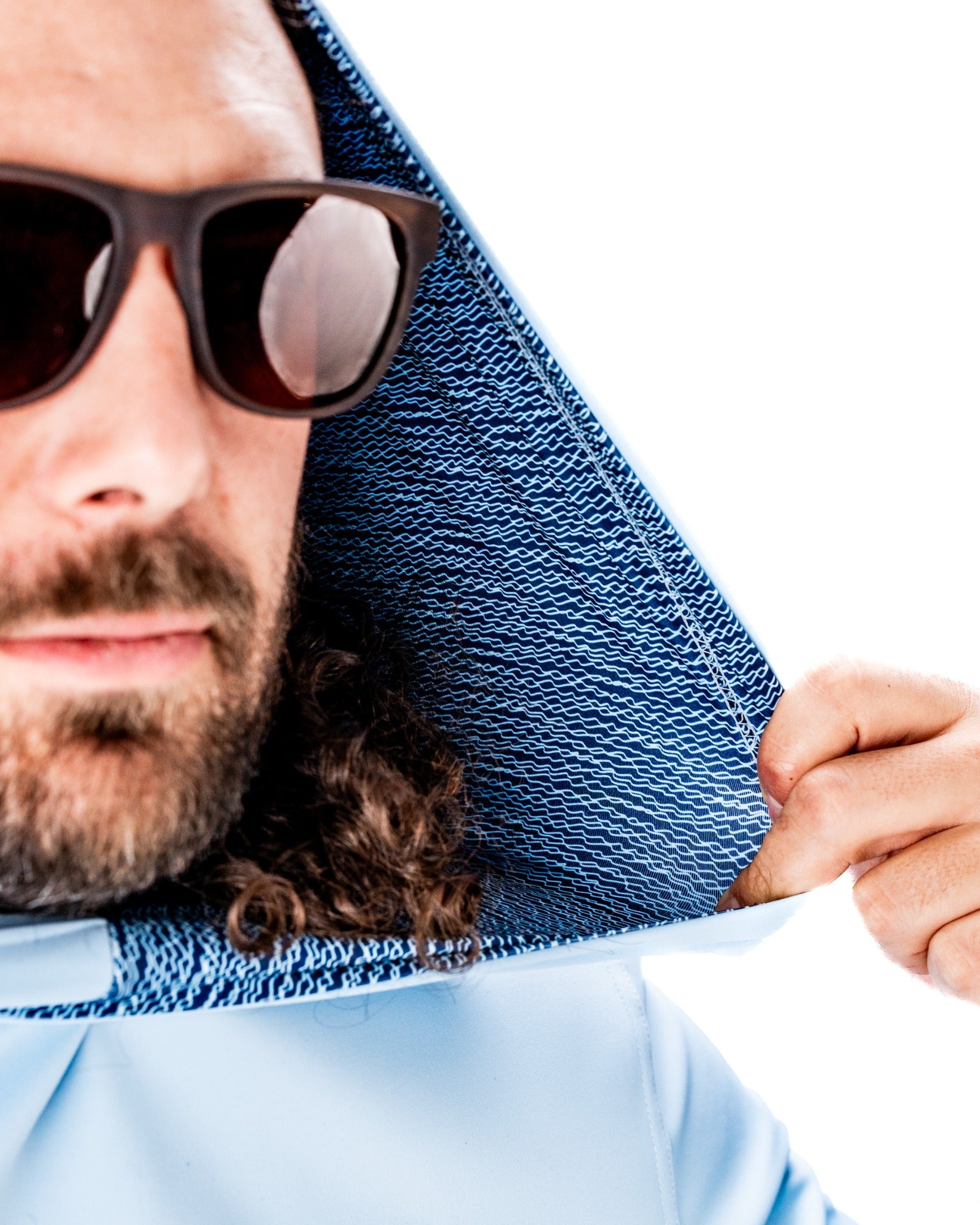 Performance Golf Hoodie in Squiggle Blue, featuring a textured hood and a stylish look for golfers.