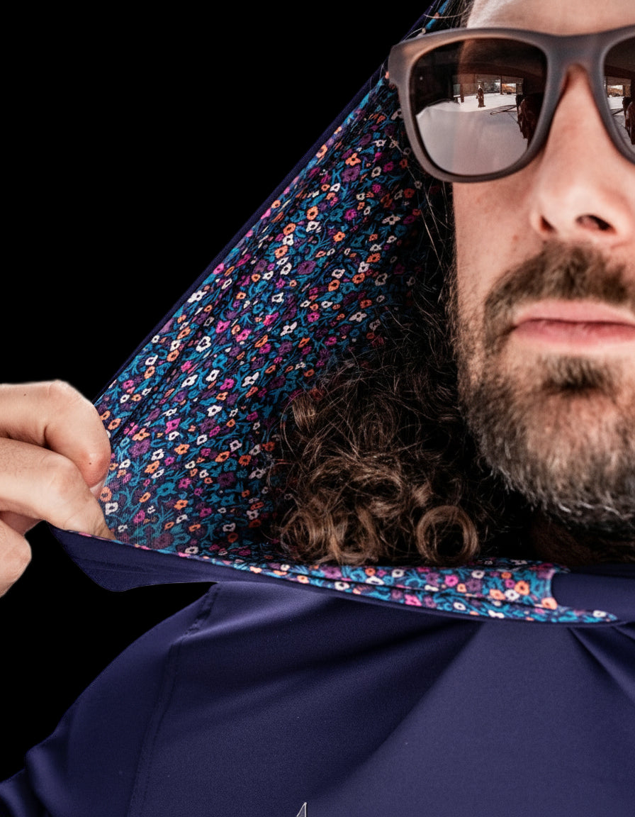 Lavender flower power performance golf hoodie showcasing vibrant floral lining and a stylish, modern design.