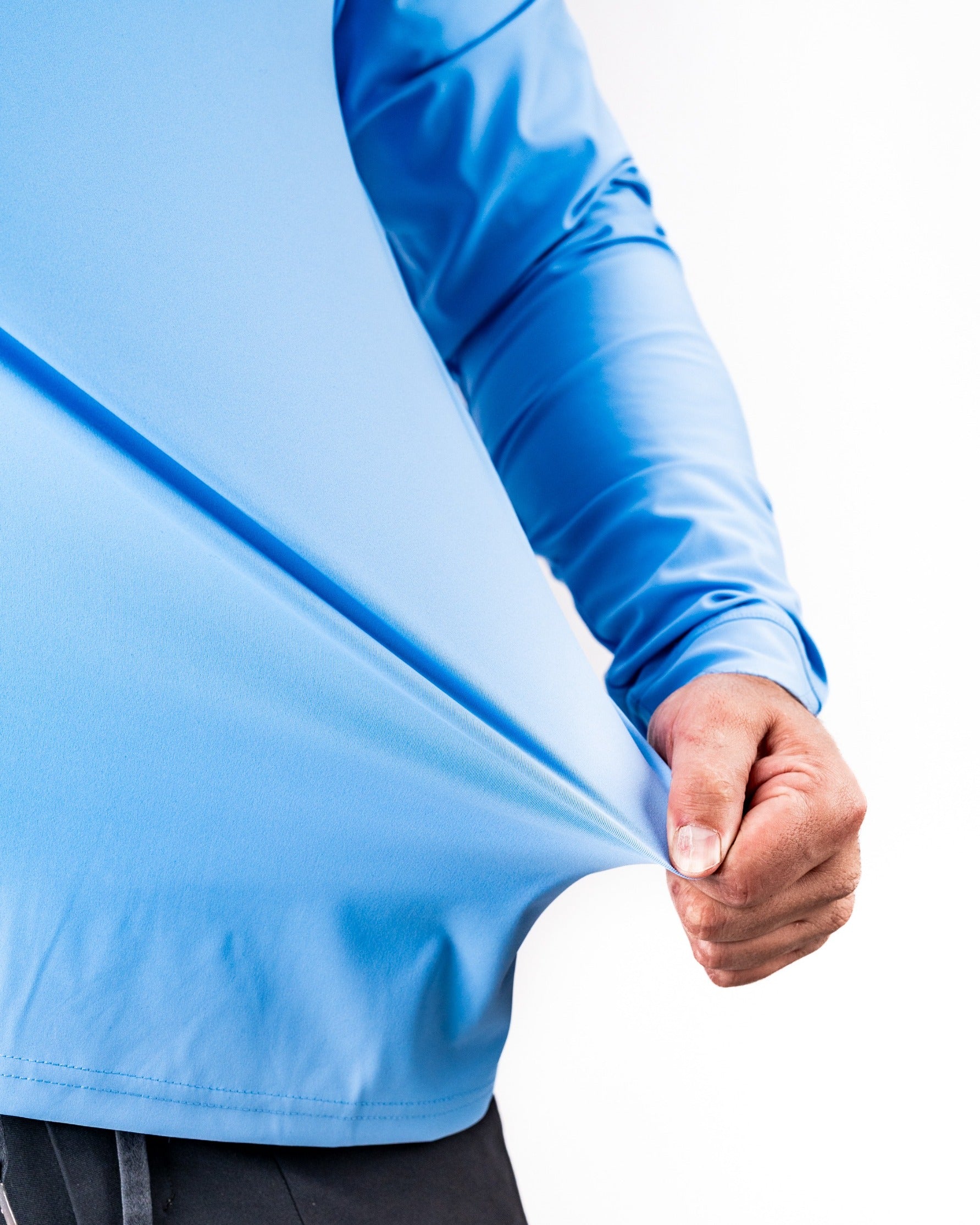 Light blue Performance Golf Hoodie - Rising Tides 2.0, showcasing its stretchable fabric and comfortable fit for golfers.