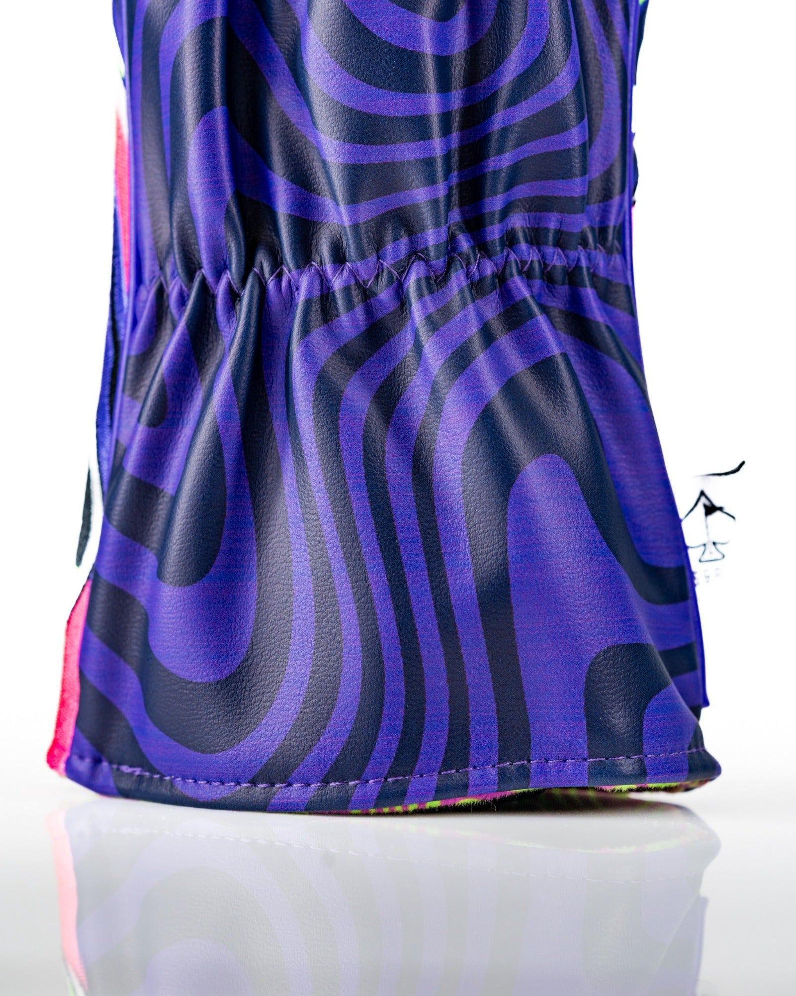 Bold purple and pink patterned driver cover featuring a unique alien design, perfect for golfers seeking standout style.