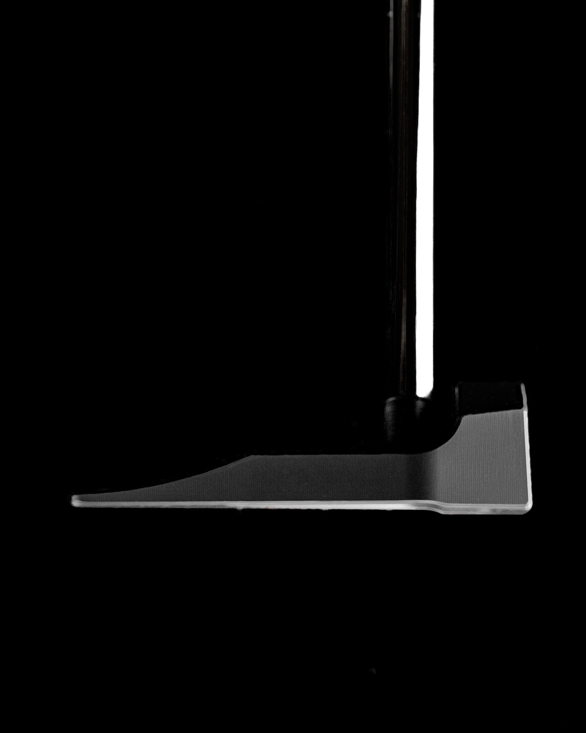 Sleek mallet putter head with a minimalist design, showcasing the E-T01 Zero Torque by Edel Golf against a dark background.