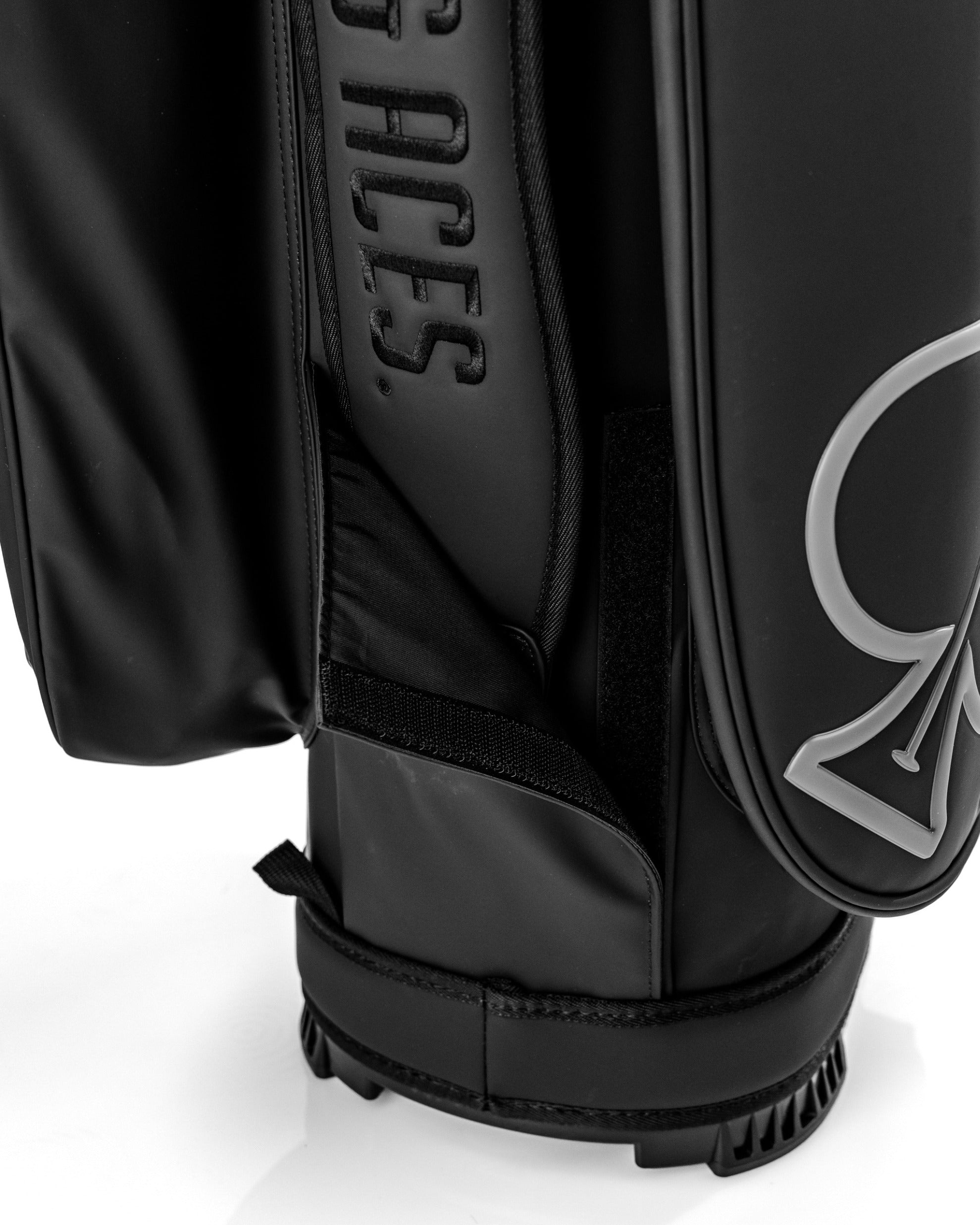 Sleek black Player Preferred™ cart bag featuring a stylish design and practical storage pockets for golfers.