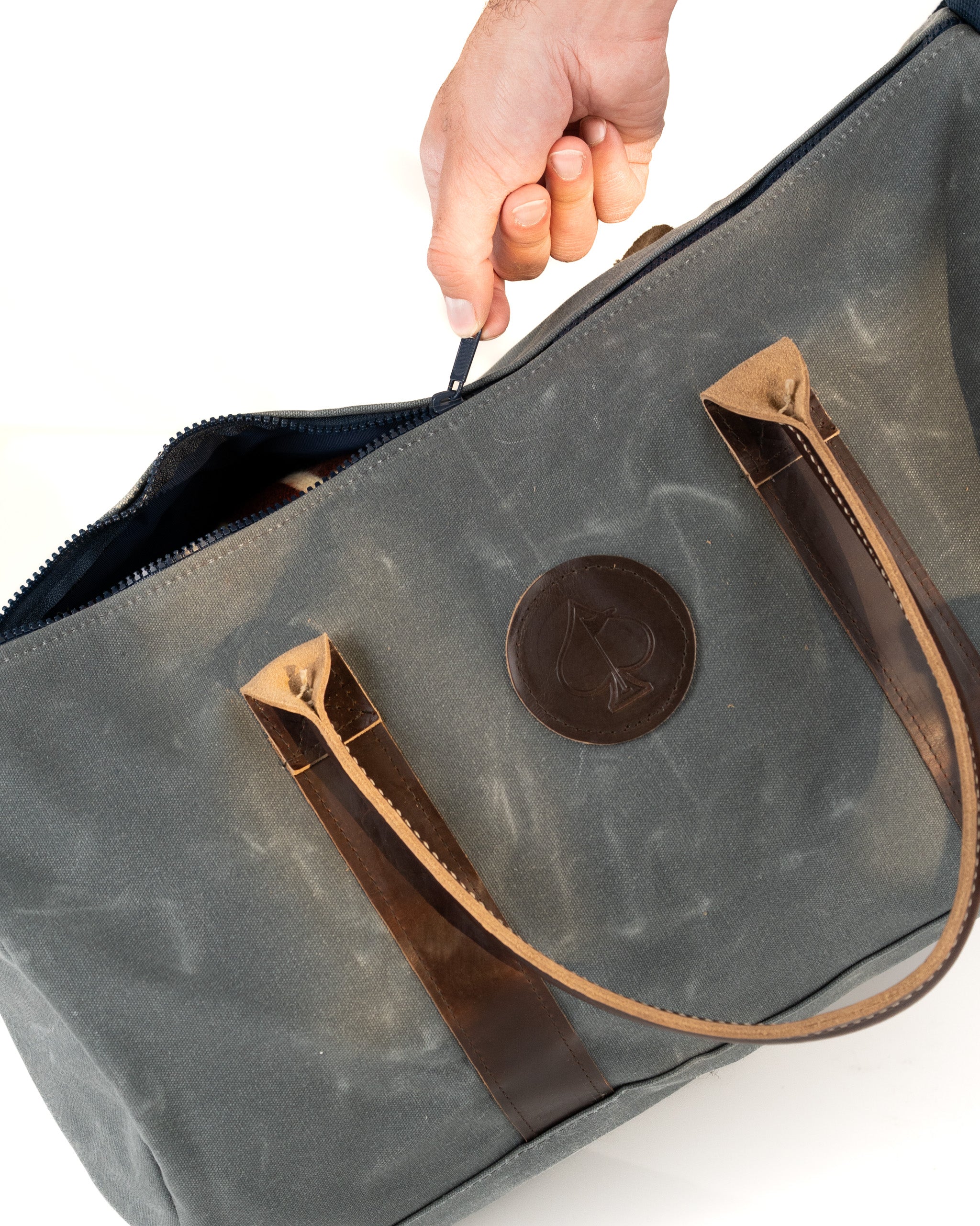 Stylish Black Friday duffel bag with leather straps and a logo, perfect for golf gear and accessories.