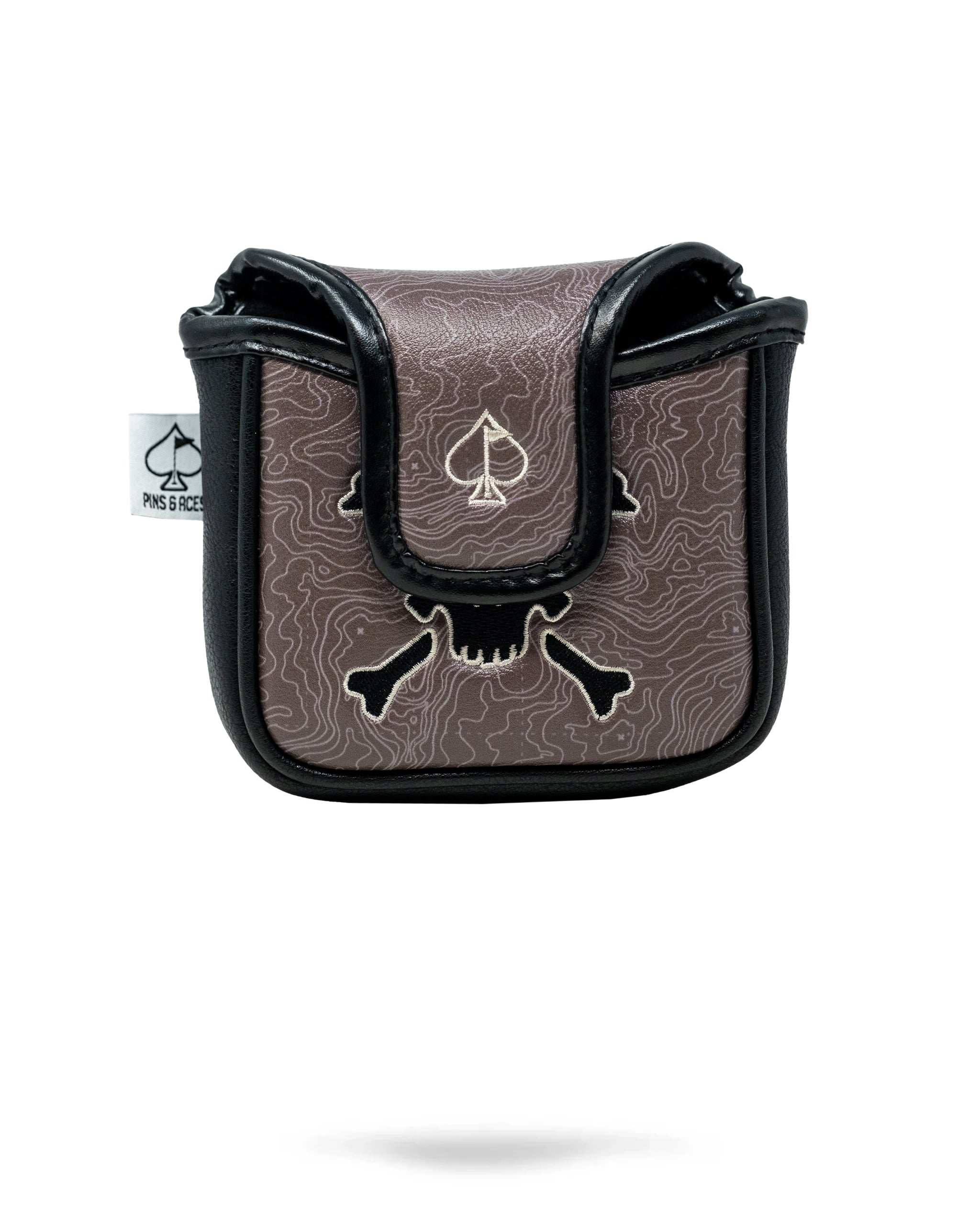 Bold skull and spade golf headcover with black, gray, and white design, perfect for standing out on the course.