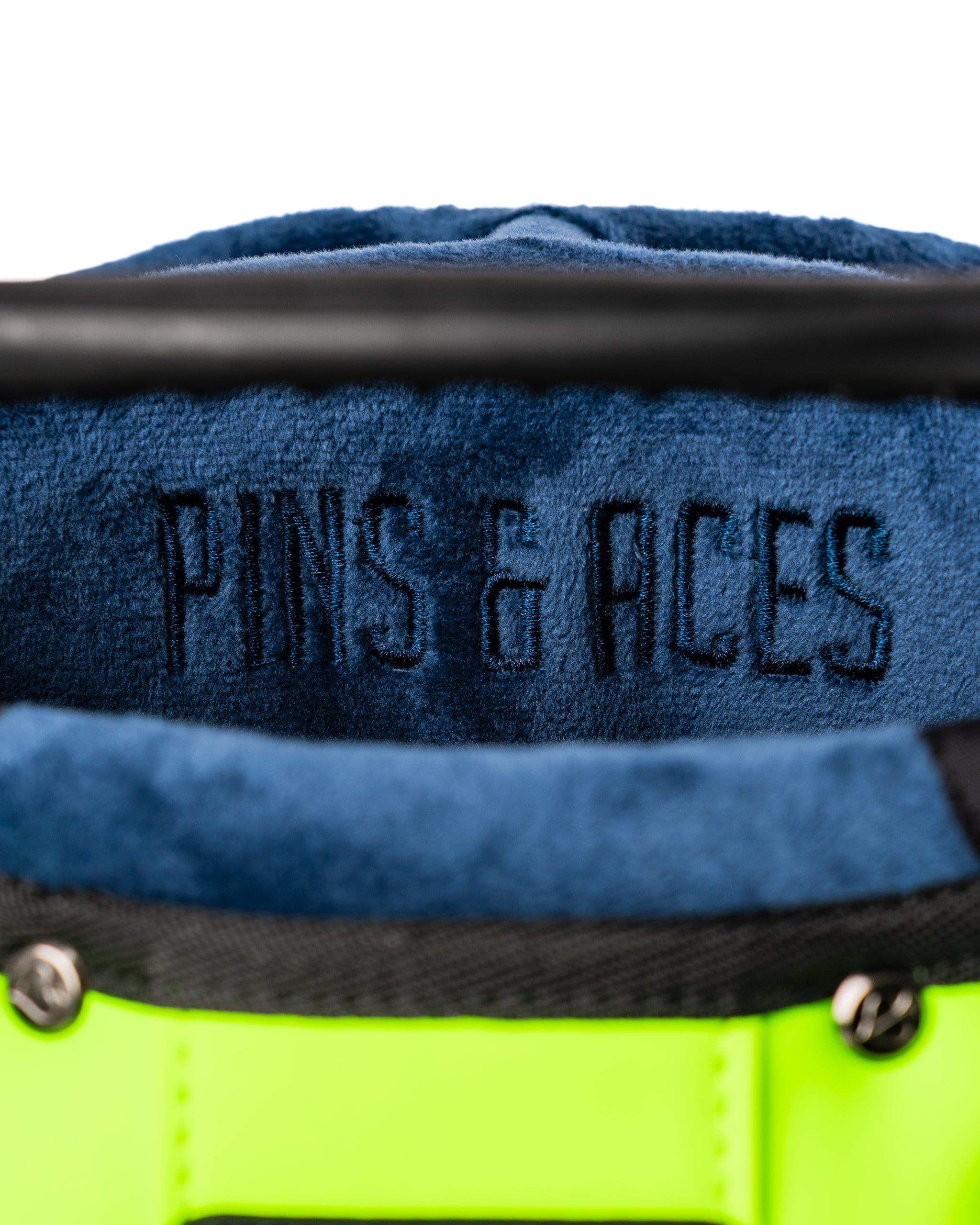 Interior view of the Player Preferred Golf Bag in Electric Tide, featuring the embroidered "Pins & Aces" logo.