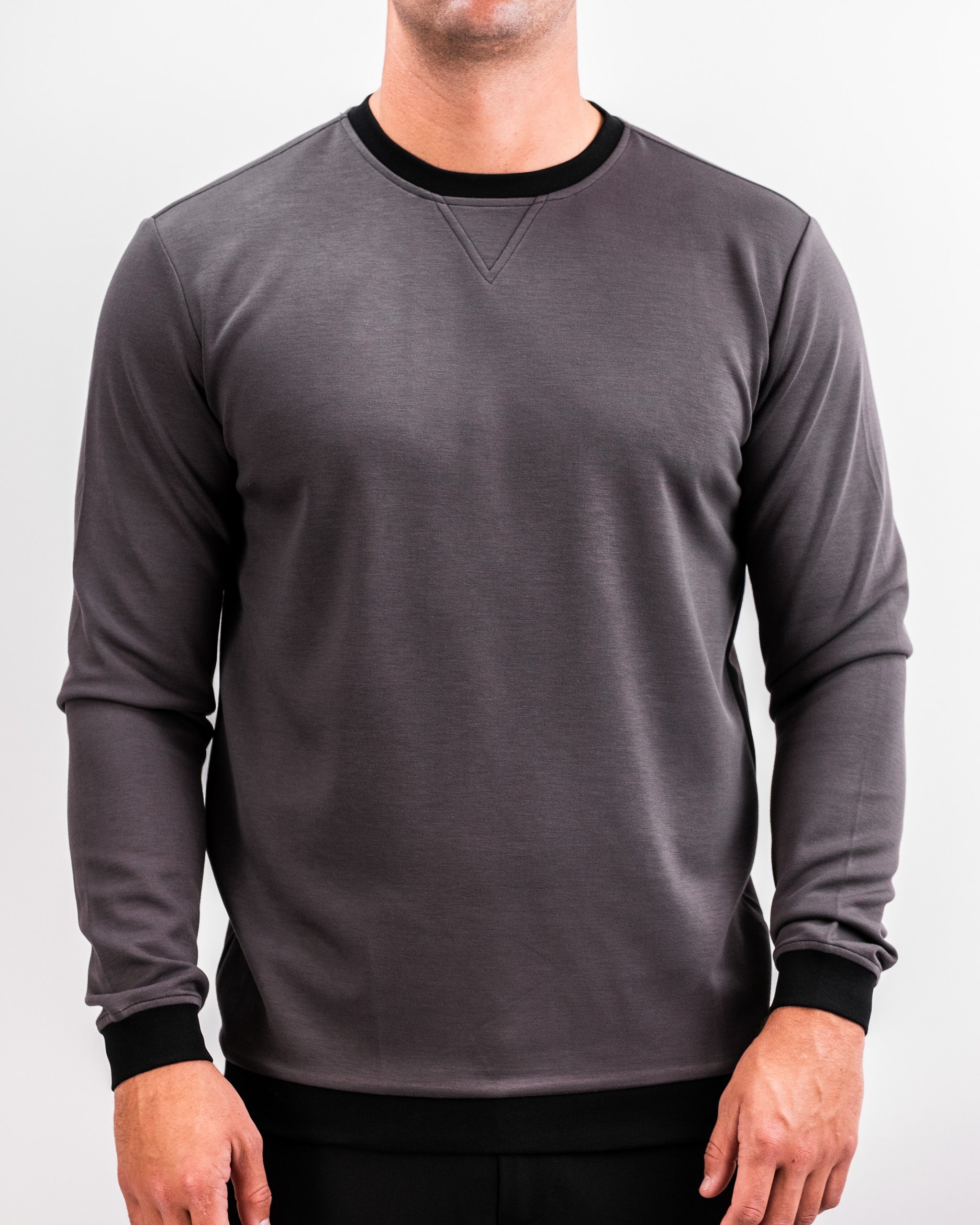 Men's slate grey Player Preferred™ crewneck sweatshirt with black trim at the collar and cuffs, made from soft, comfortable fabric.