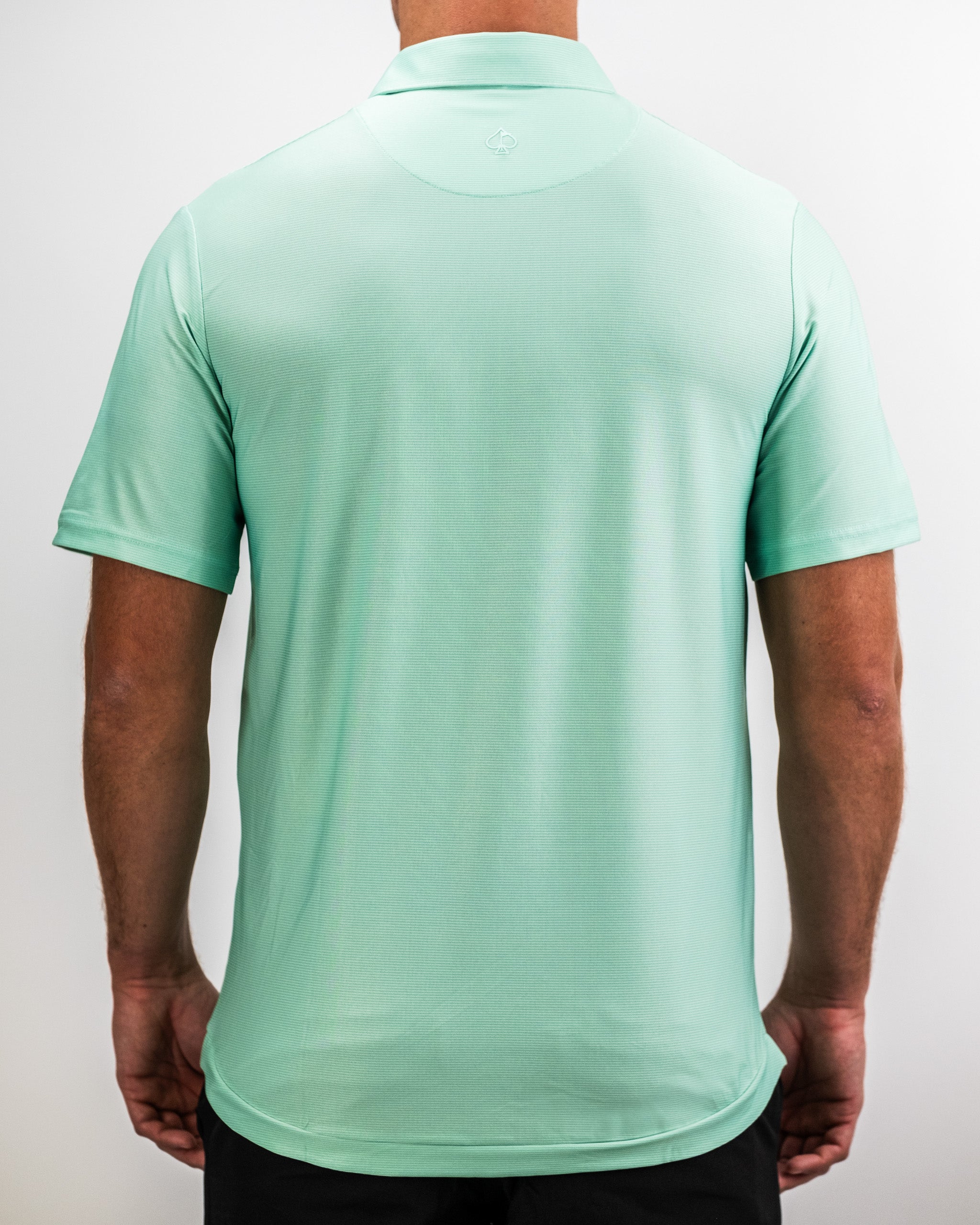Player Preferred™ Polo in spearmint stripes, showcasing a lightweight fabric and modern design.