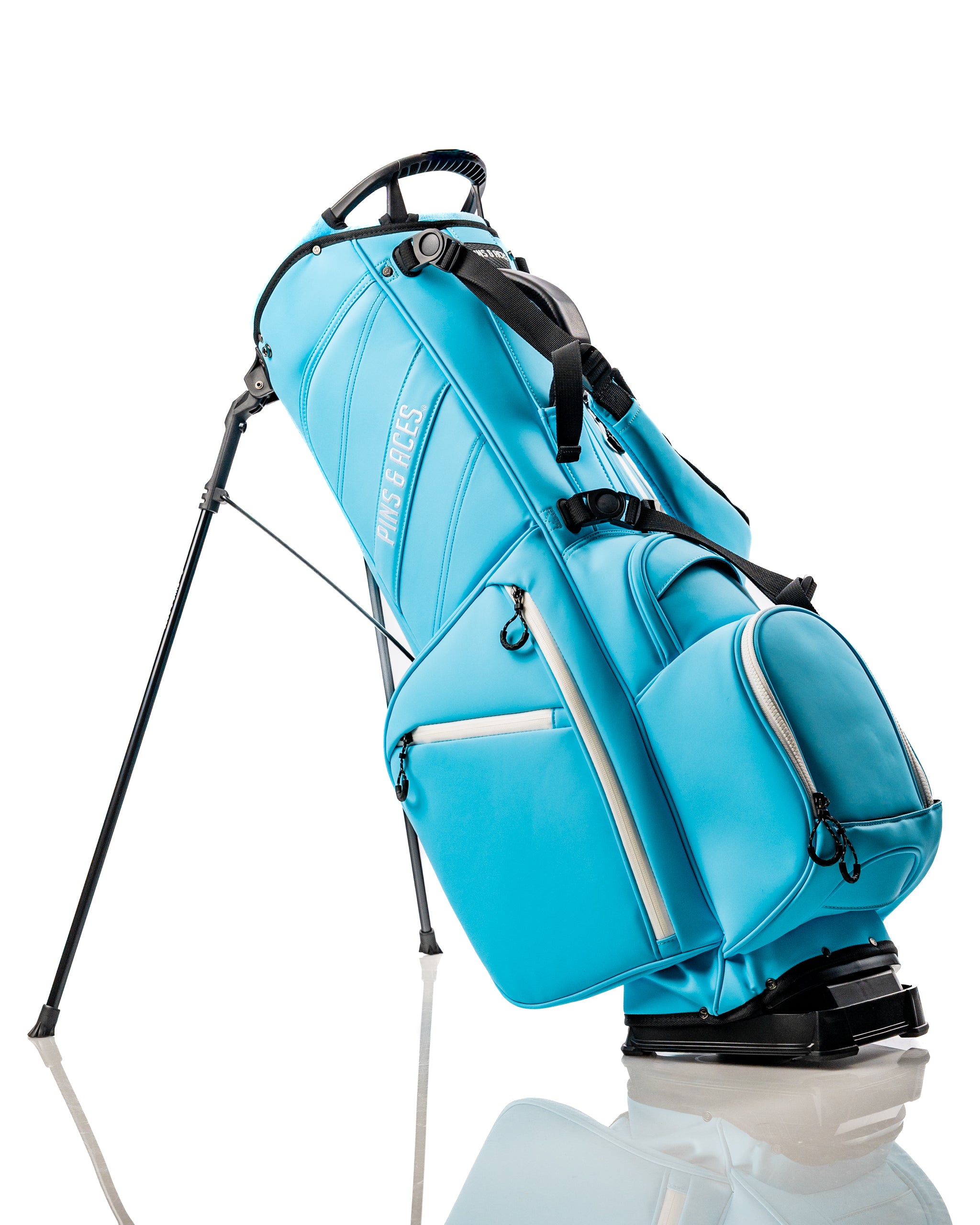 Bright blue Player Preferred Golf Bag with a sleek design, featuring adjustable straps and a sturdy stand for golfers.