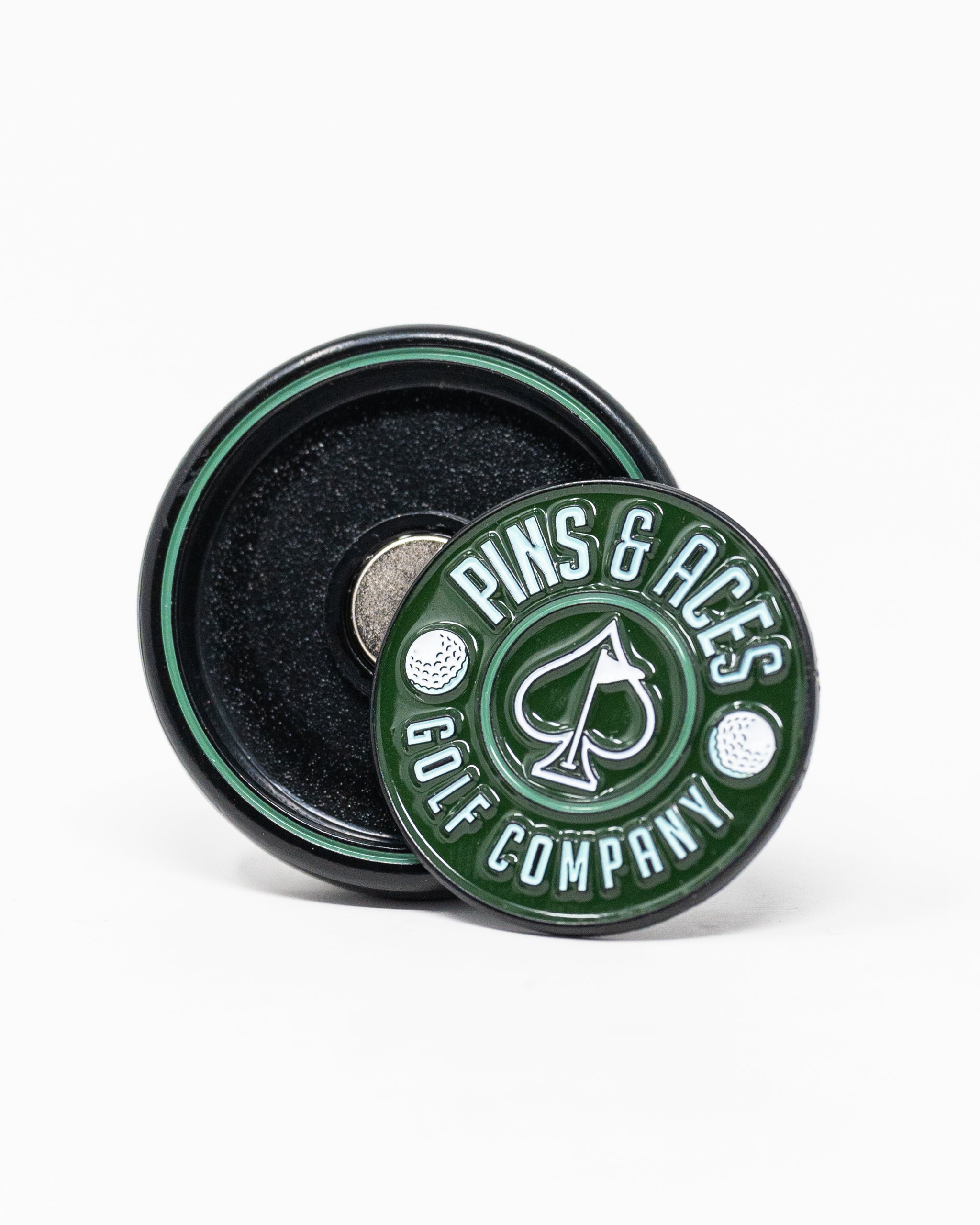 Green Pop Out Medallion Ball Marker with a sleek, round design.