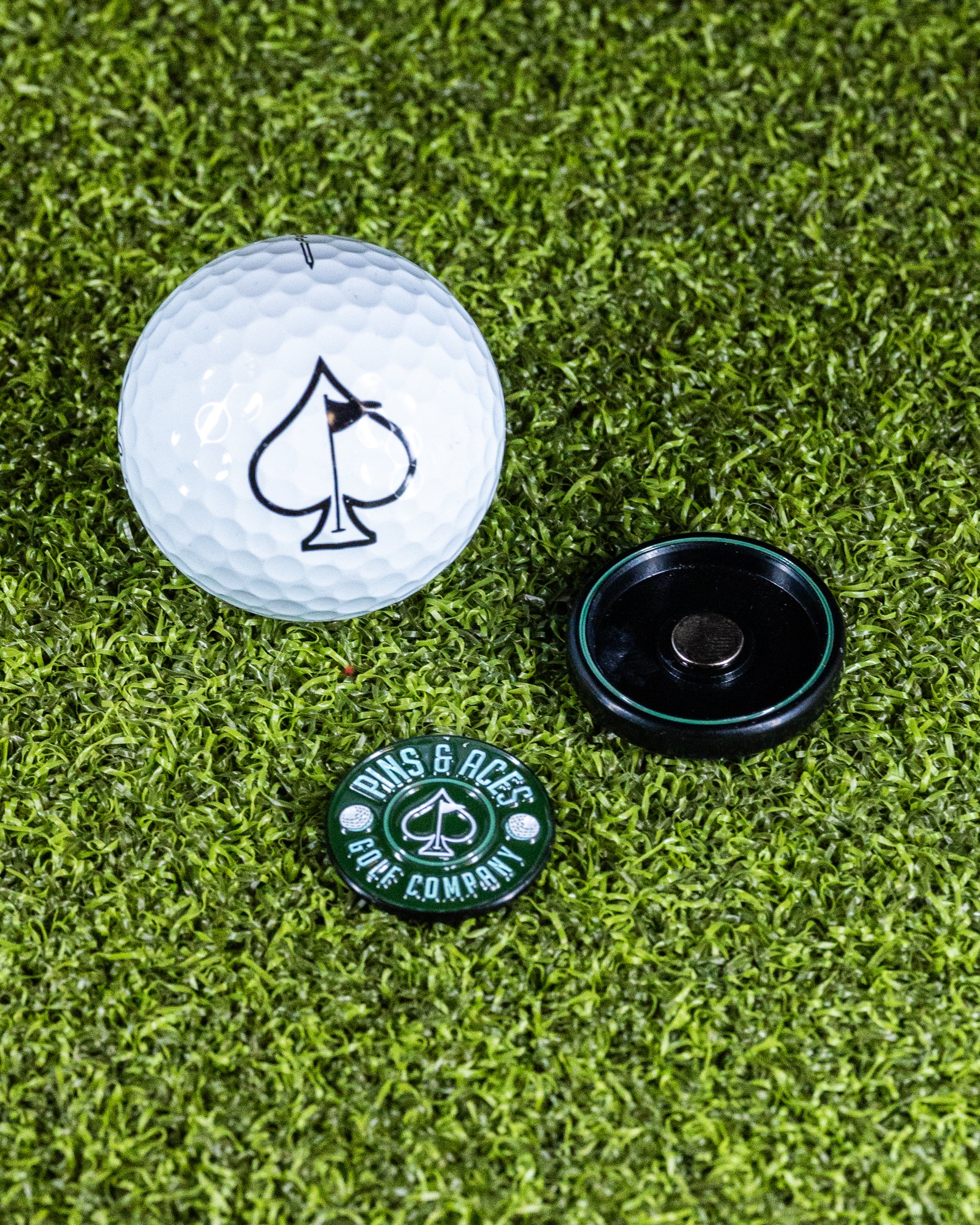 Green Pop Out Medallion Ball Marker featuring a sleek design for golf enthusiasts.