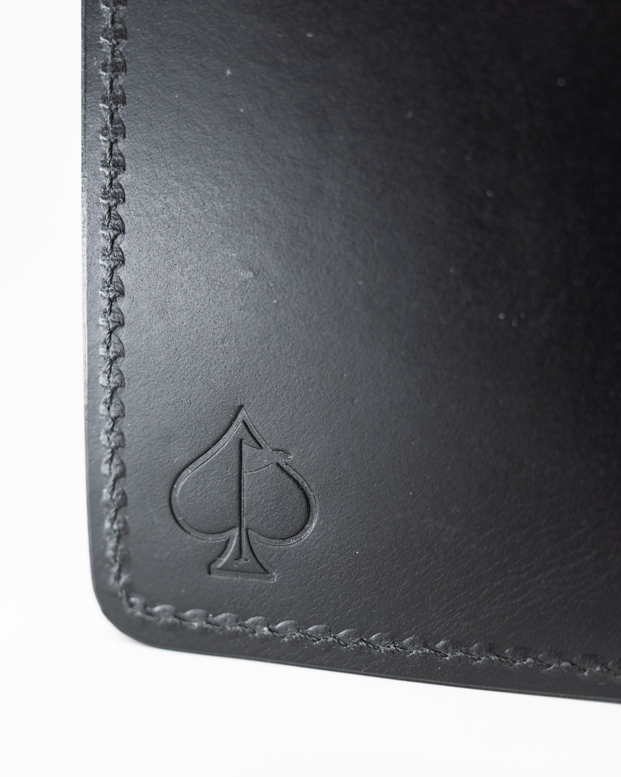 Miles Wallet in smooth Italian black leather, featuring a sleek design and minimalistic style.