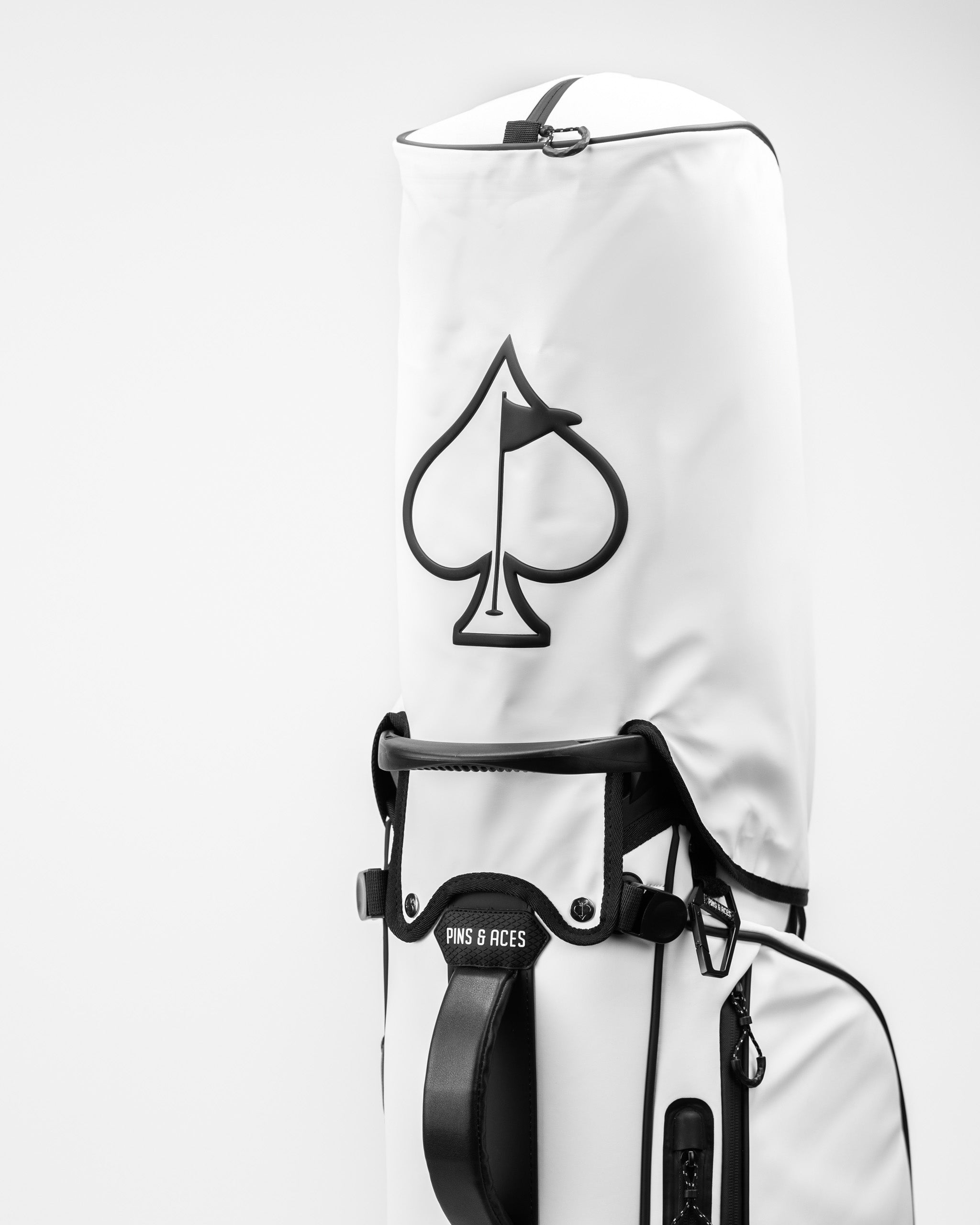 Alt text: Player Preferred™ Golf Bag in Domino pattern, featuring a stylish design and rain hood.