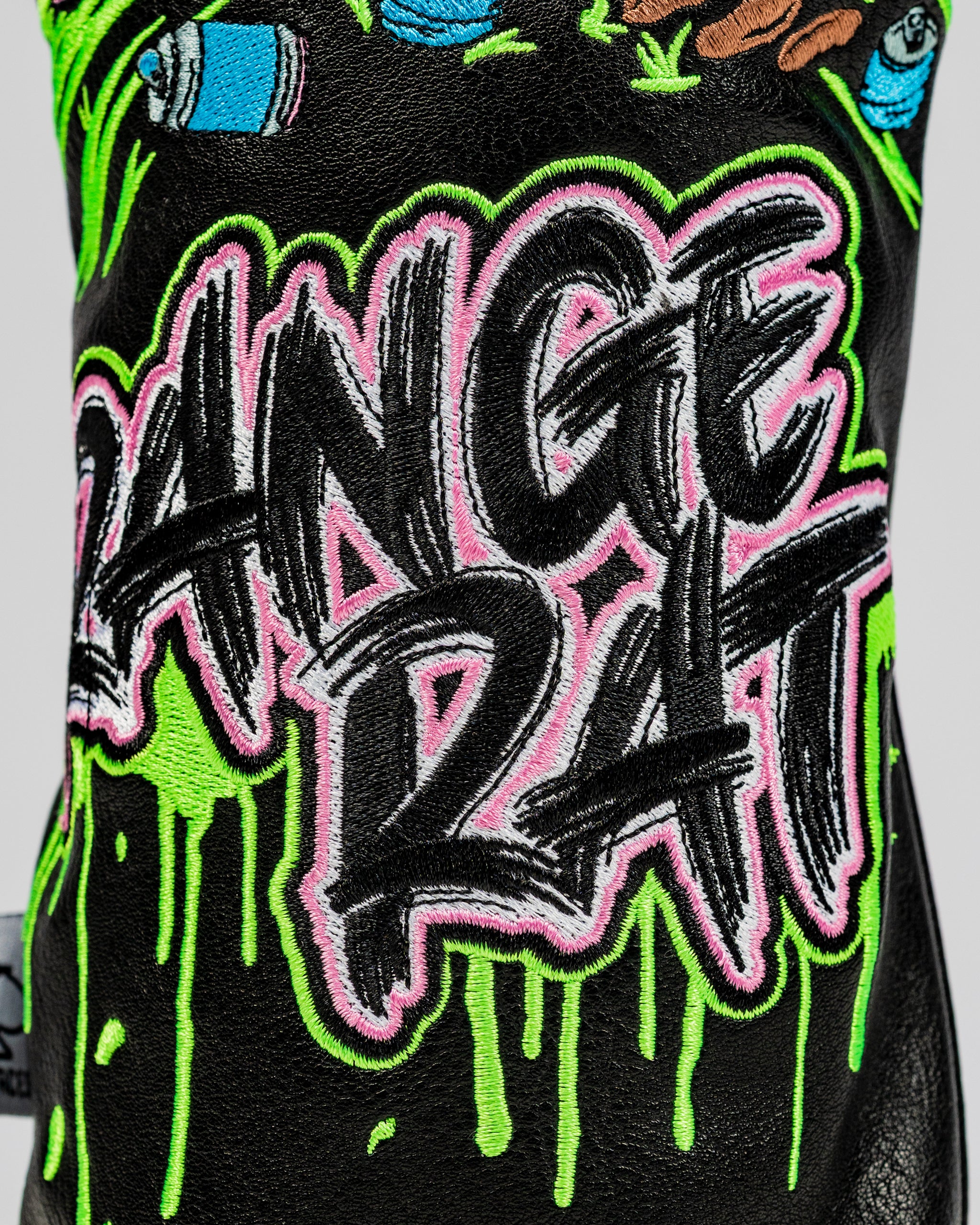 Bold driver cover featuring vibrant "Range Rat" graffiti-style lettering with a dripping paint effect, perfect for standout golfers.