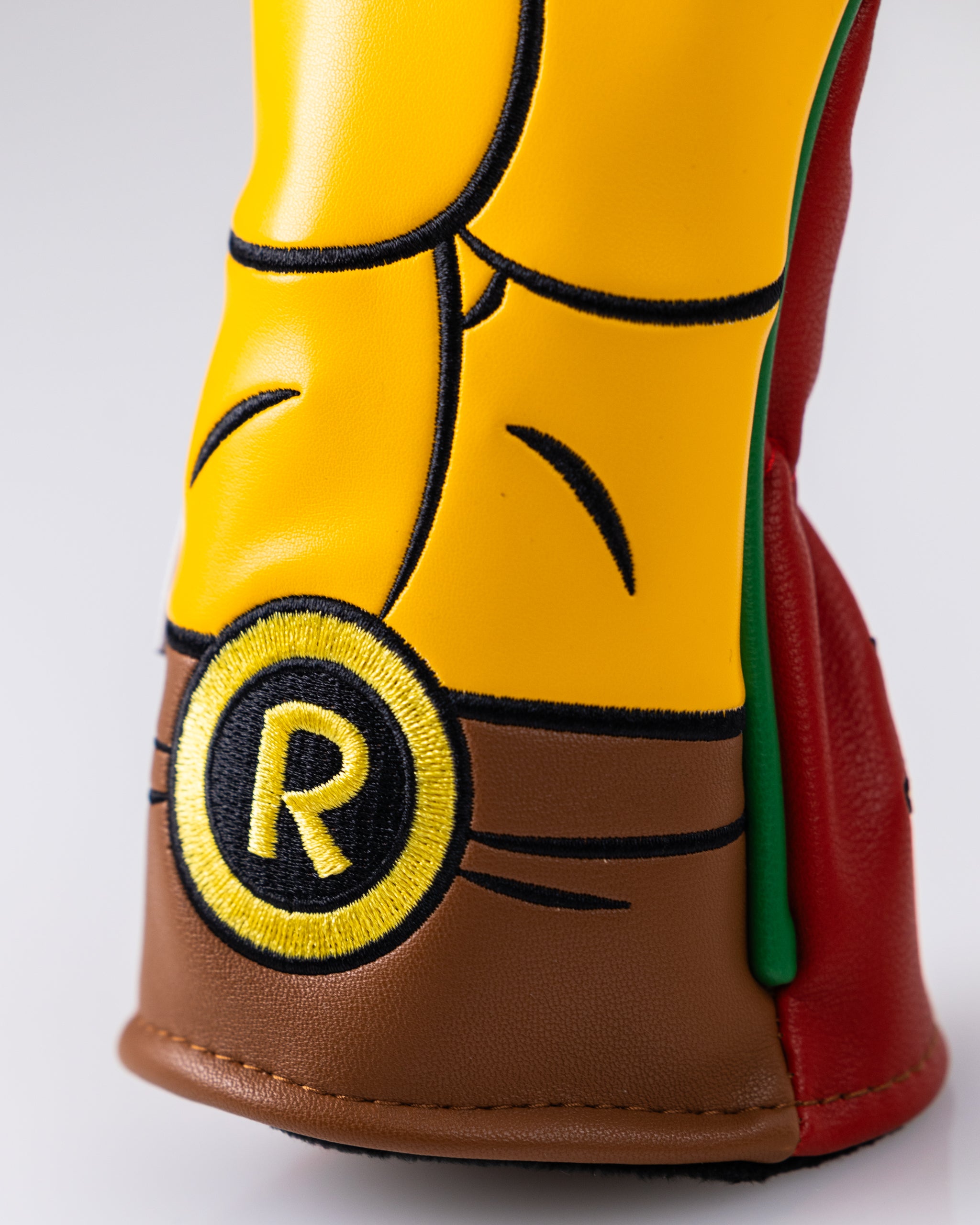 TMNT Raphael Hybrid Cover featuring a dynamic illustration of Raphael, showcasing his signature red mask and dual sai weapons, set against a vibrant background.