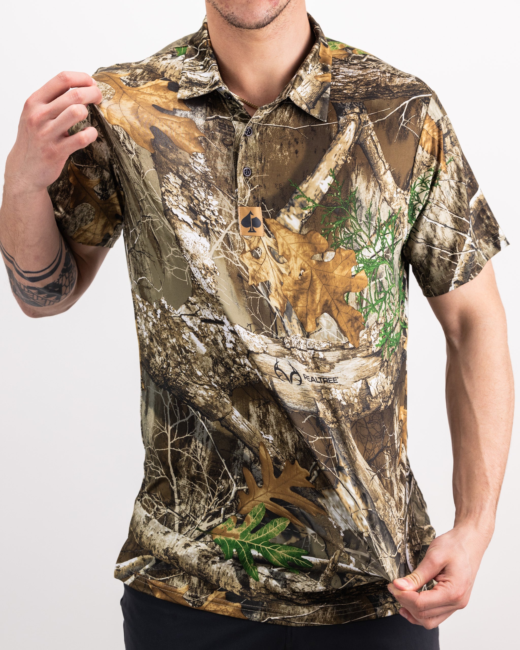Realtree Edge Polo shirt featuring a camouflage pattern with a classic collar and short sleeves.