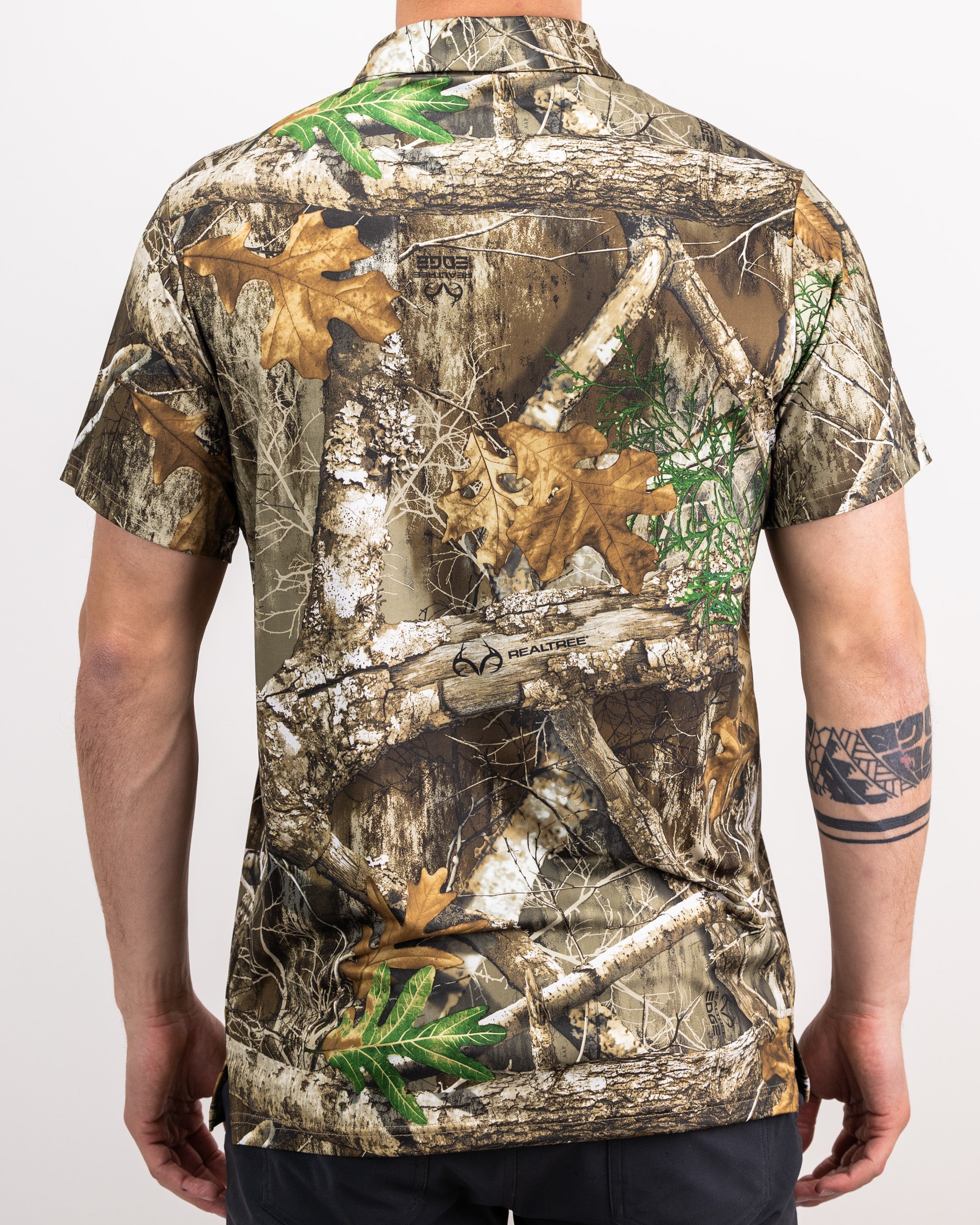 Men's Realtree Edge Polo in camouflage pattern, showcasing a classic fit and short sleeves.