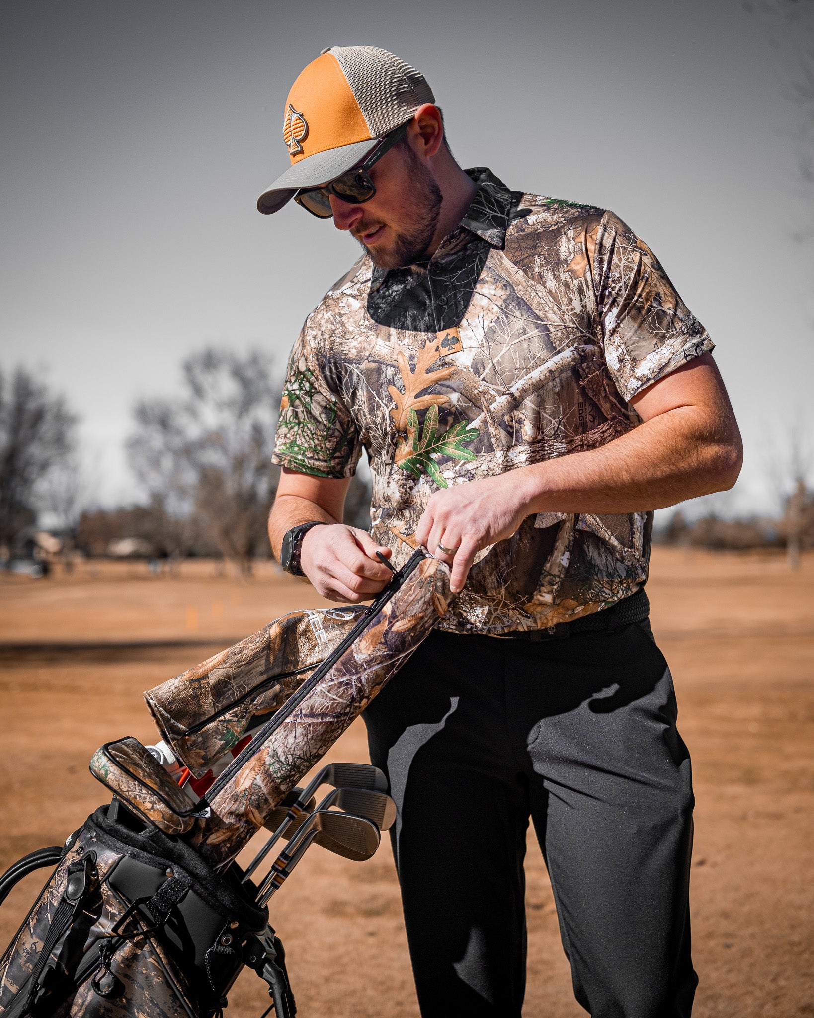 Realtree Edge Polo shirt featuring a camouflage pattern, designed for outdoor enthusiasts.