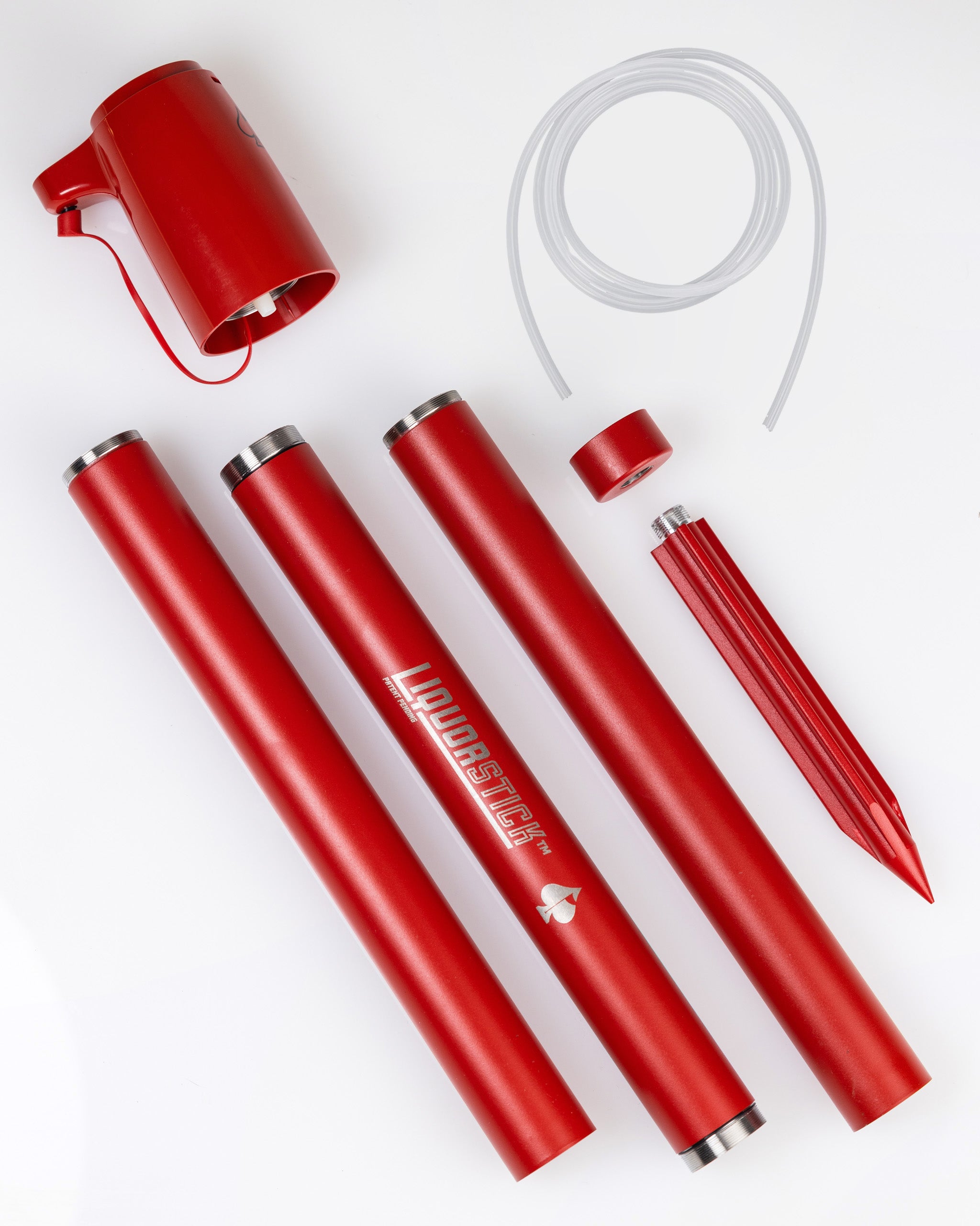 Red LiquorStik golf ball injection system with tubes and headcover, for bold, standout golf accessories.