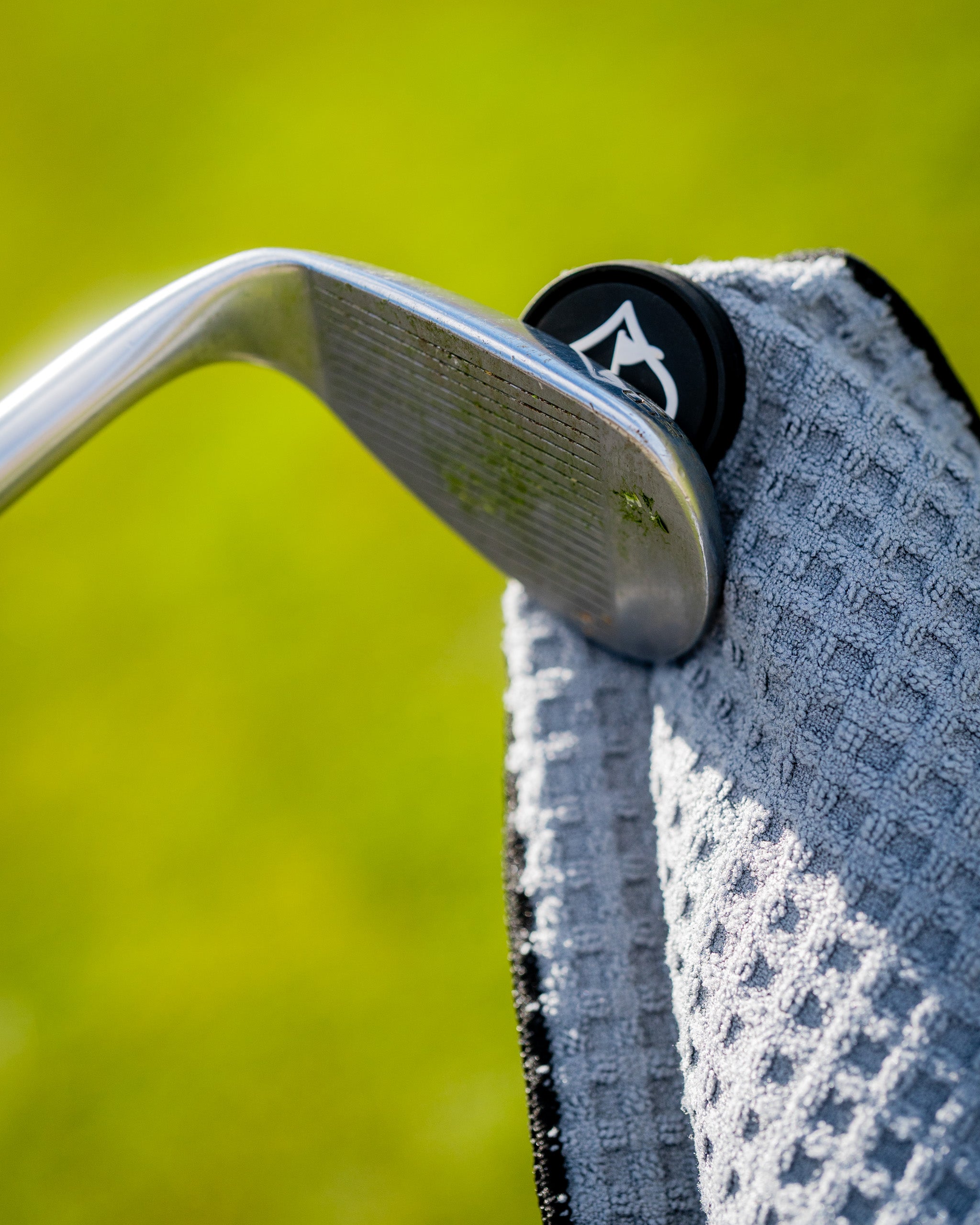 Magnetic white towel featuring a sleek design and practical magnetic attachment for easy use.