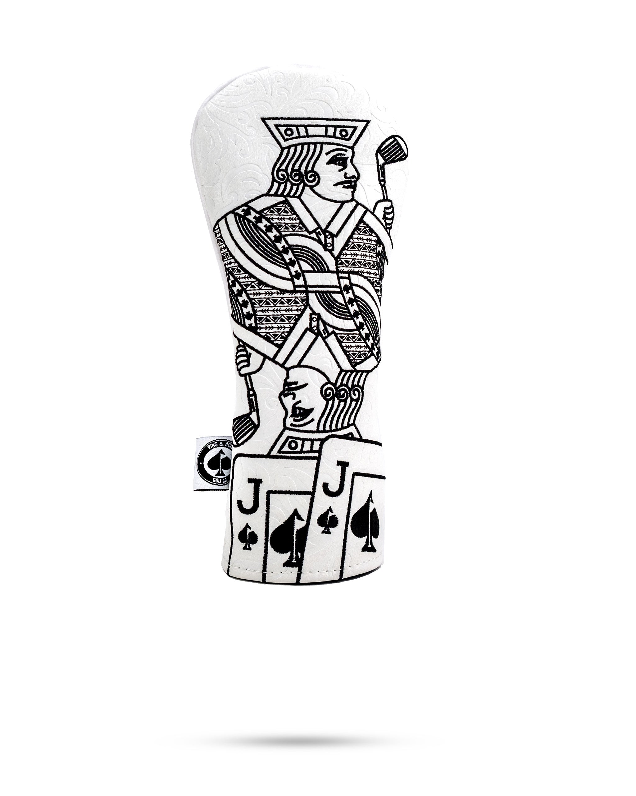 Black and white golf club headcover featuring a bold, artistic king playing golf, with playing card suit details.