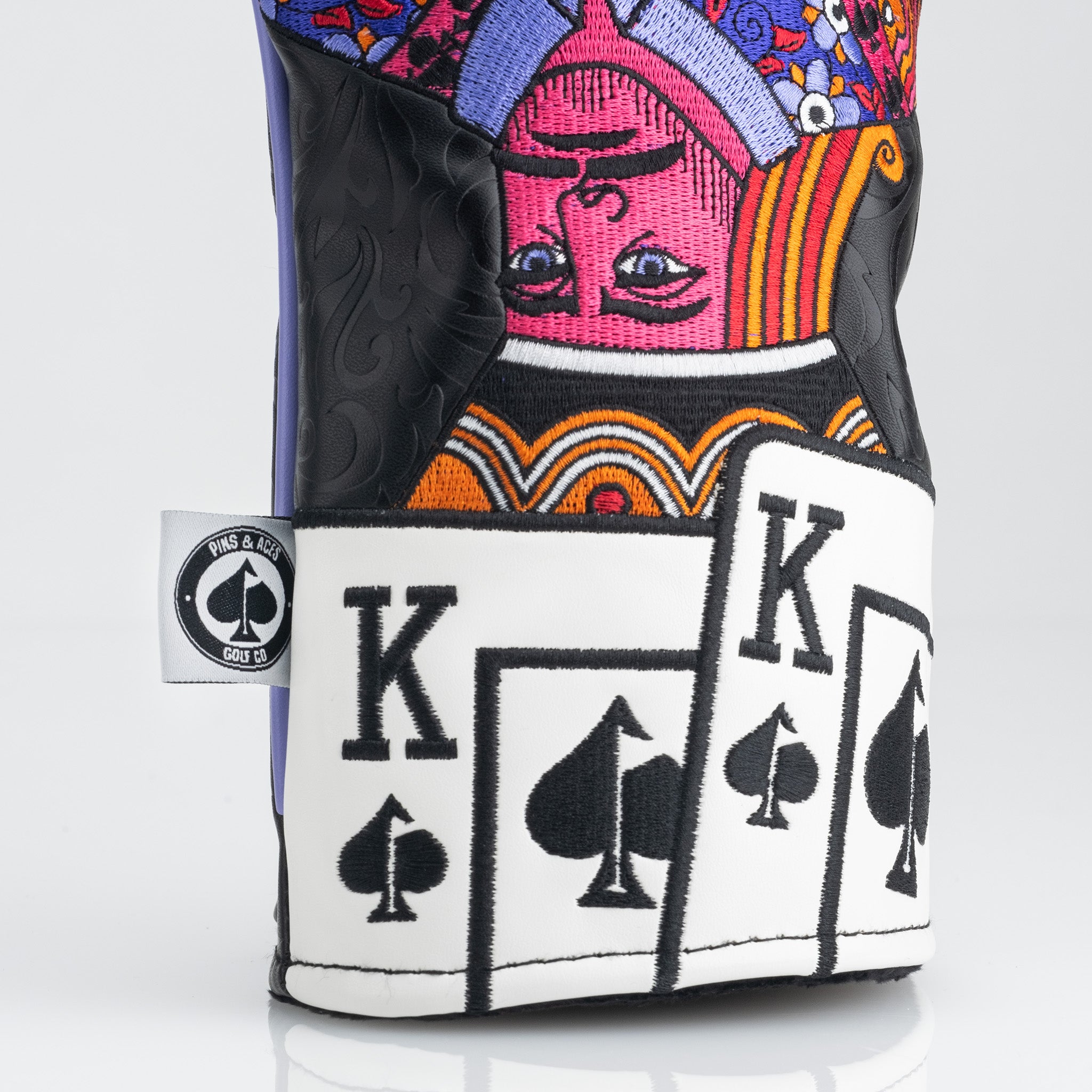 Royal Flush Headcover Set featuring vibrant designs of playing cards and a queen motif, perfect for stylish golfers.