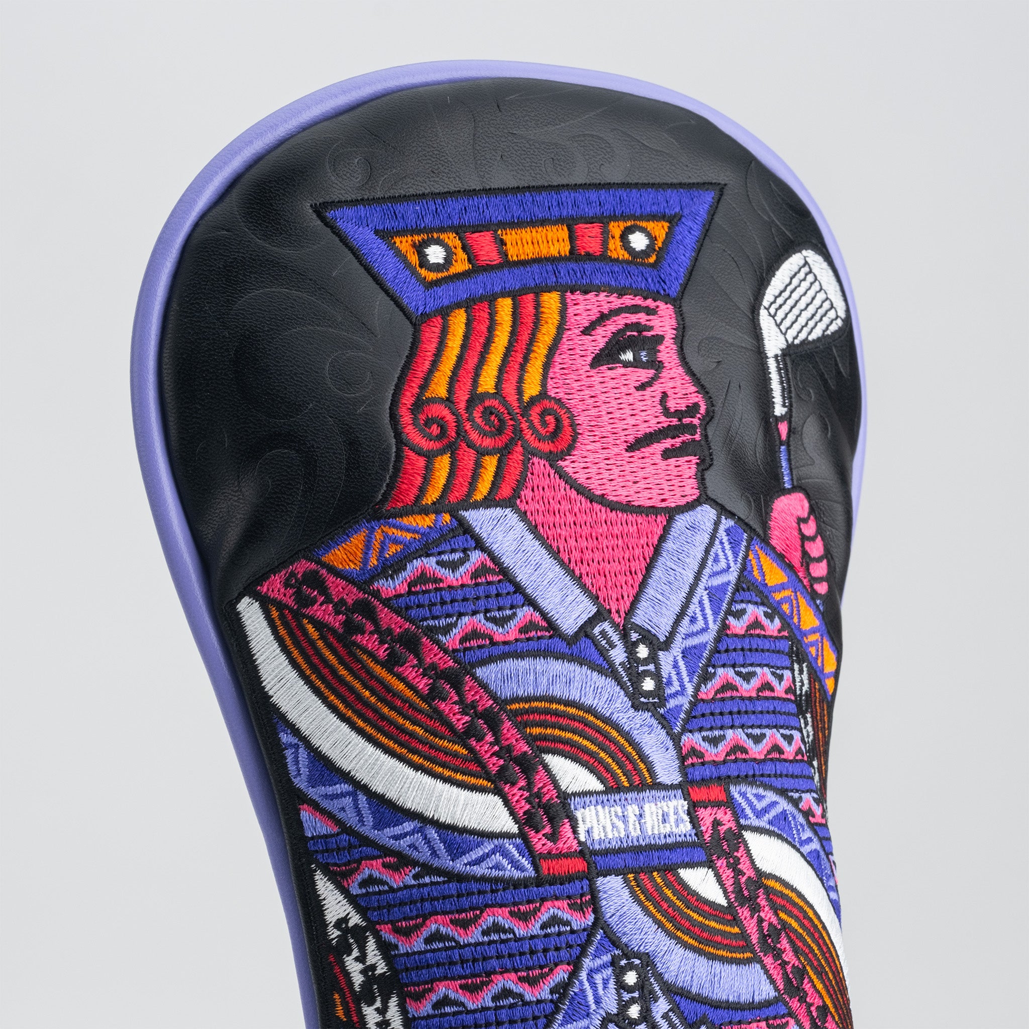 Bold Royal Flush headcover set featuring a vibrant embroidered king design, perfect for stylish golfers.