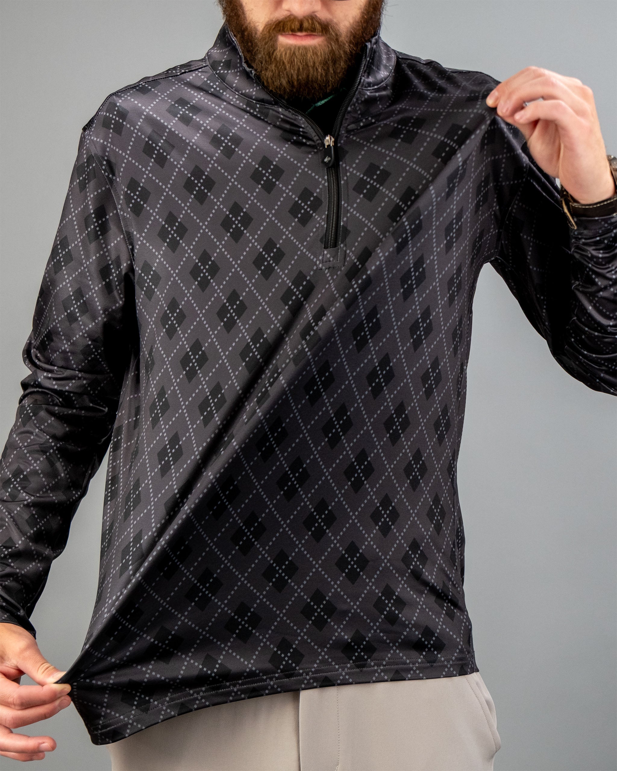 Men's London Fog pullover featuring a stylish diamond pattern and a quarter-zip design, ideal for casual wear.