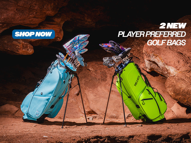 Two Player Preferred golf bags in Glacier blue and vibrant green, showcasing stylish designs and sturdy stands.