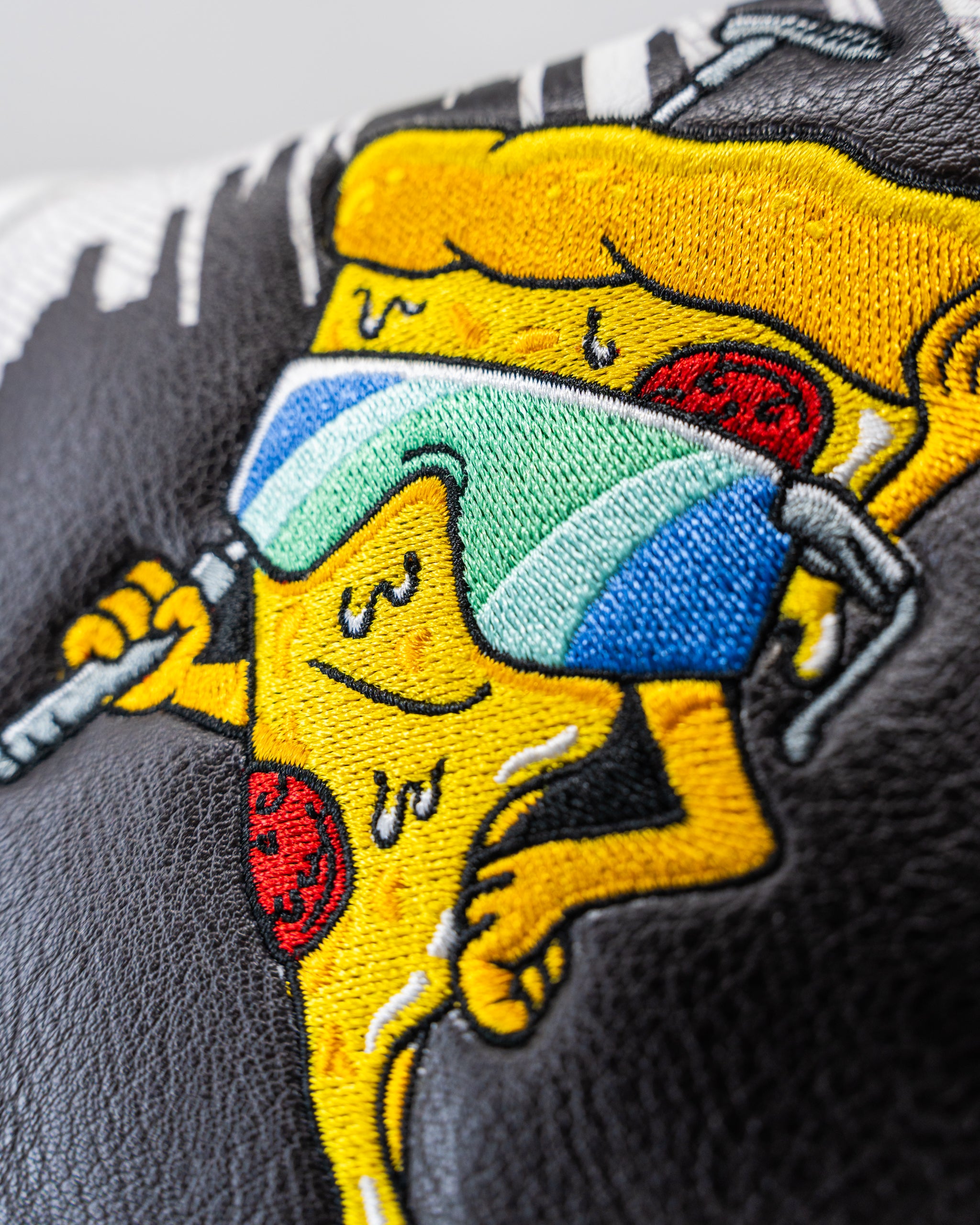 Shady Slice Mallet Cover featuring a colorful, tropical design with palm leaves and a soft, protective exterior for golf clubs.