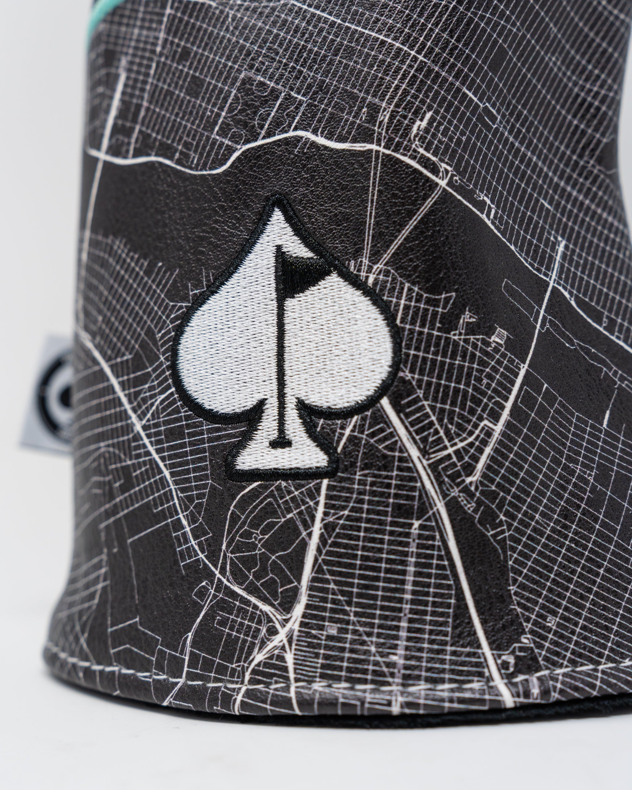 Alt text: "Shady Slice Fairway Cover featuring a vibrant green design and logo, designed to protect golf clubs from the elements."