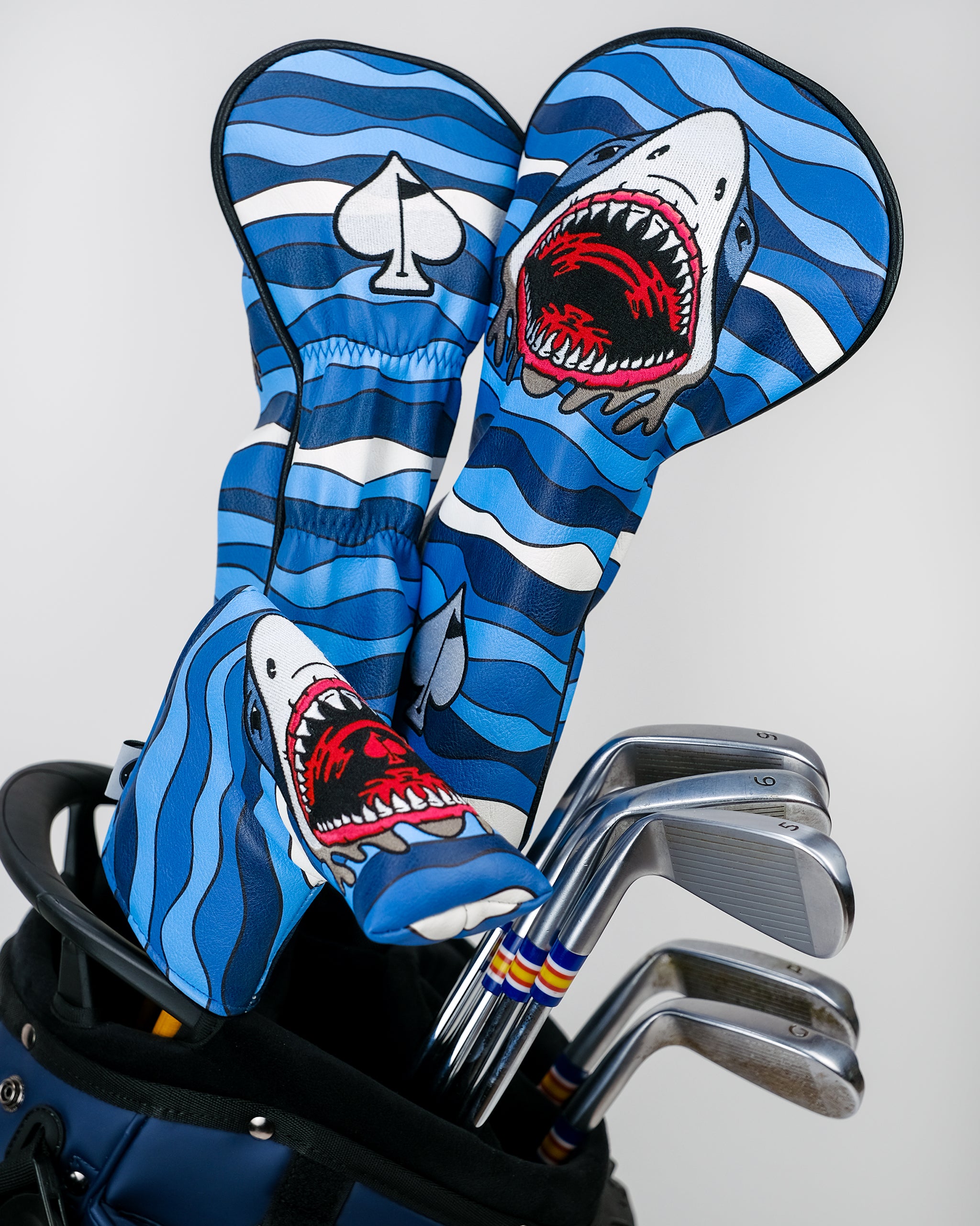 Shark Attack Blade Putter Cover featuring a vibrant shark design, ideal for protecting golf putters.