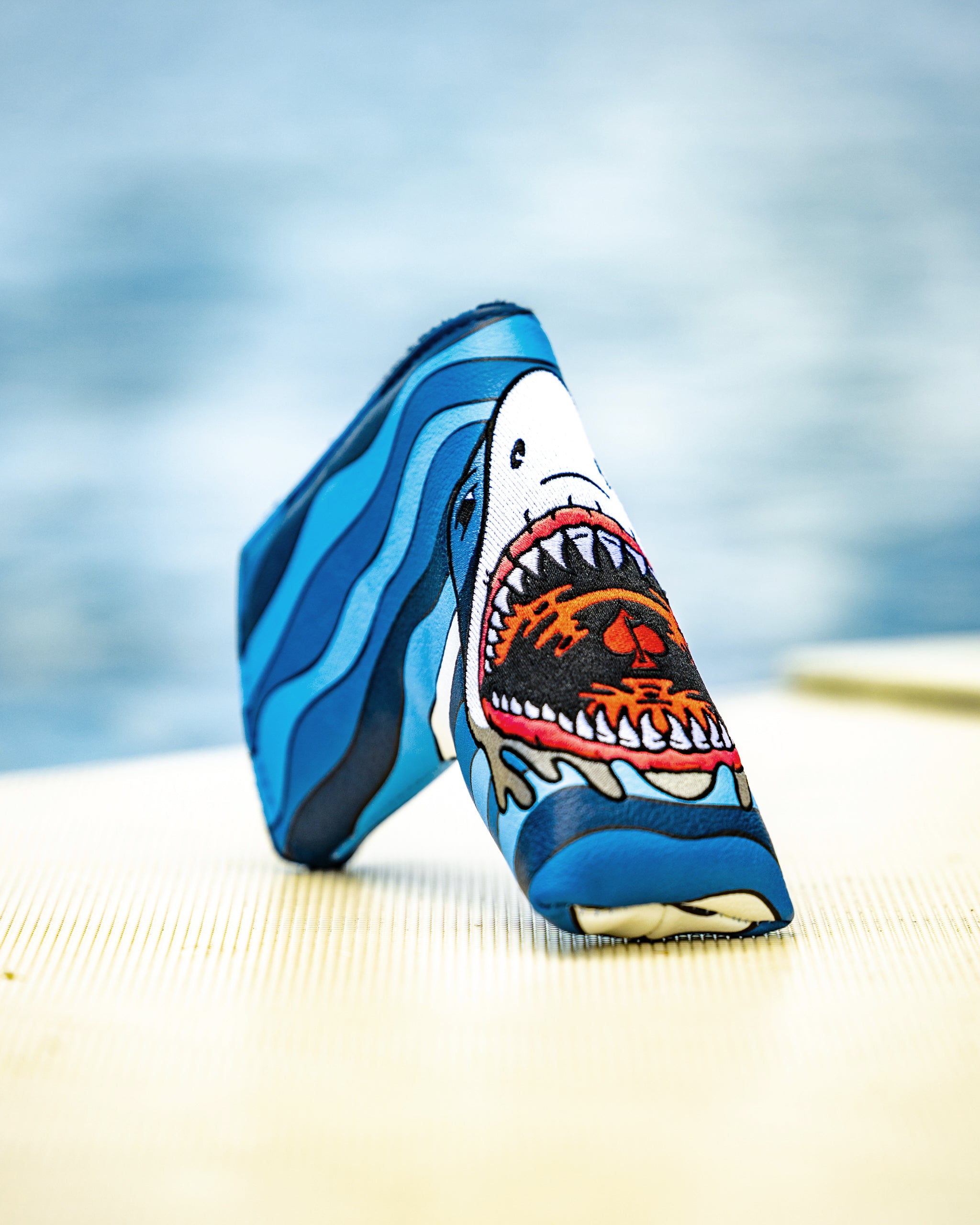 Shark Attack Blade Putter Cover featuring a vibrant shark design, ideal for golf enthusiasts.
