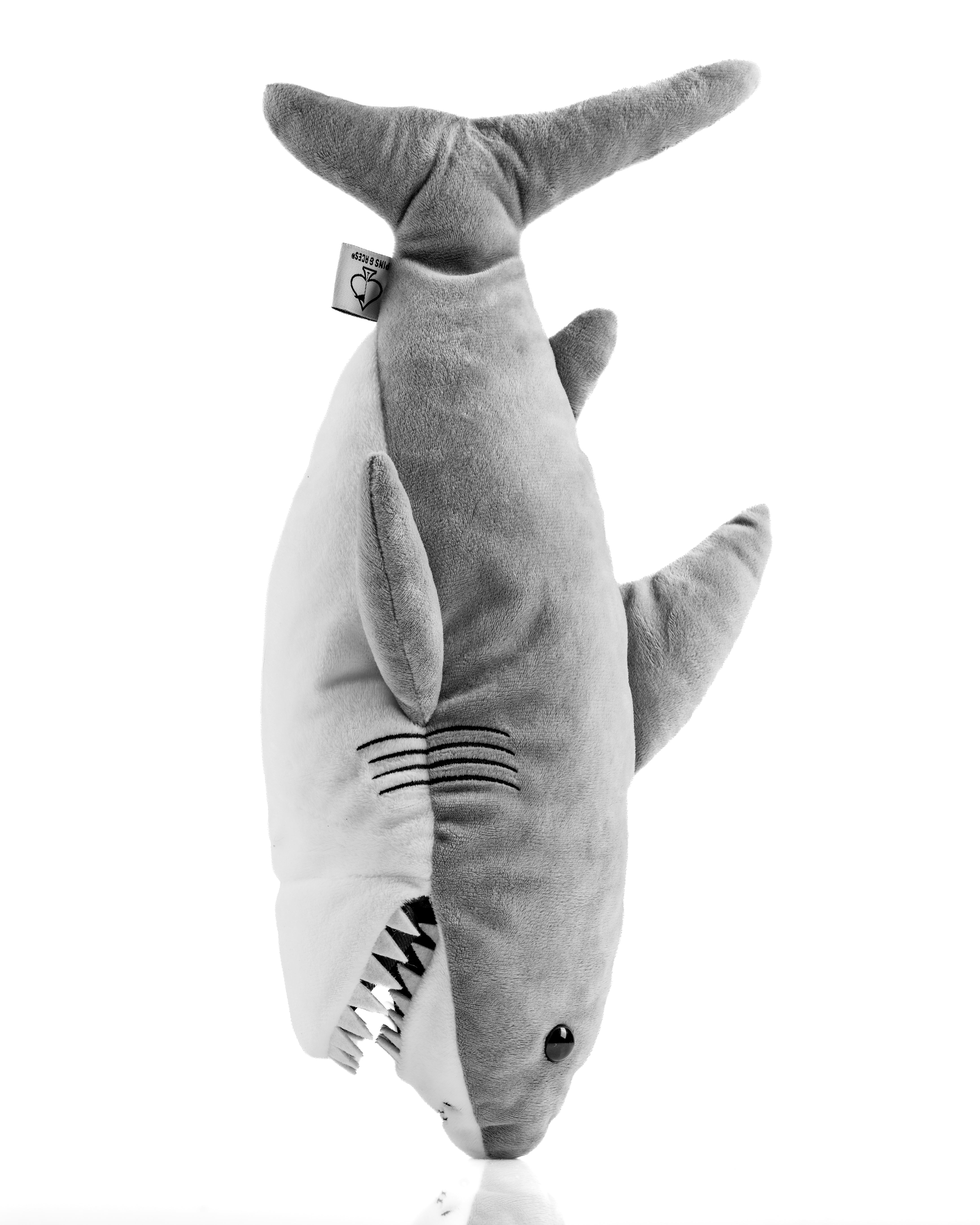 Plush shark driver cover designed to protect golf clubs with a fun and bold appearance for standout style on the course.