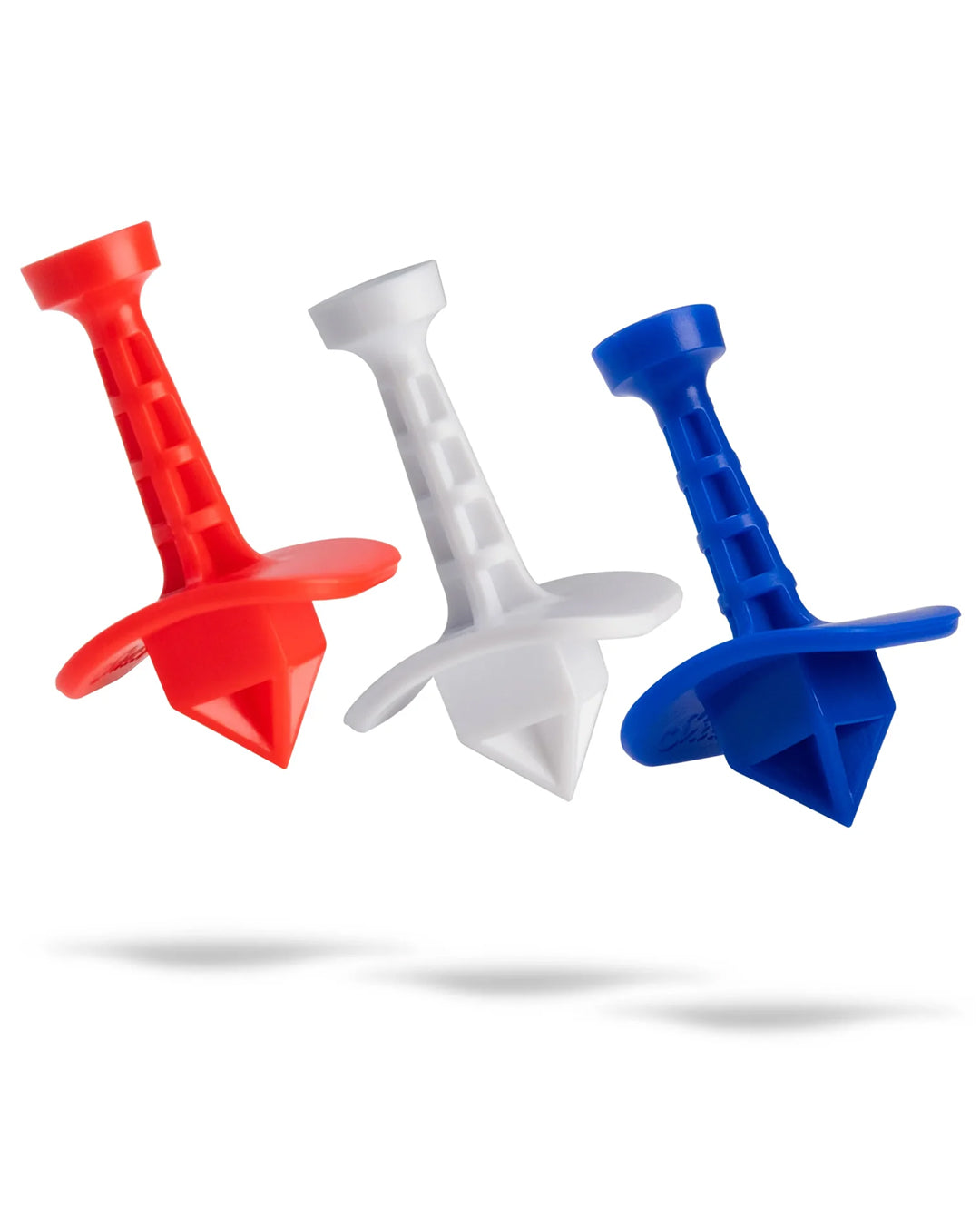 Three Shottee golf tees in red, white, and blue colors, floating against a white background.