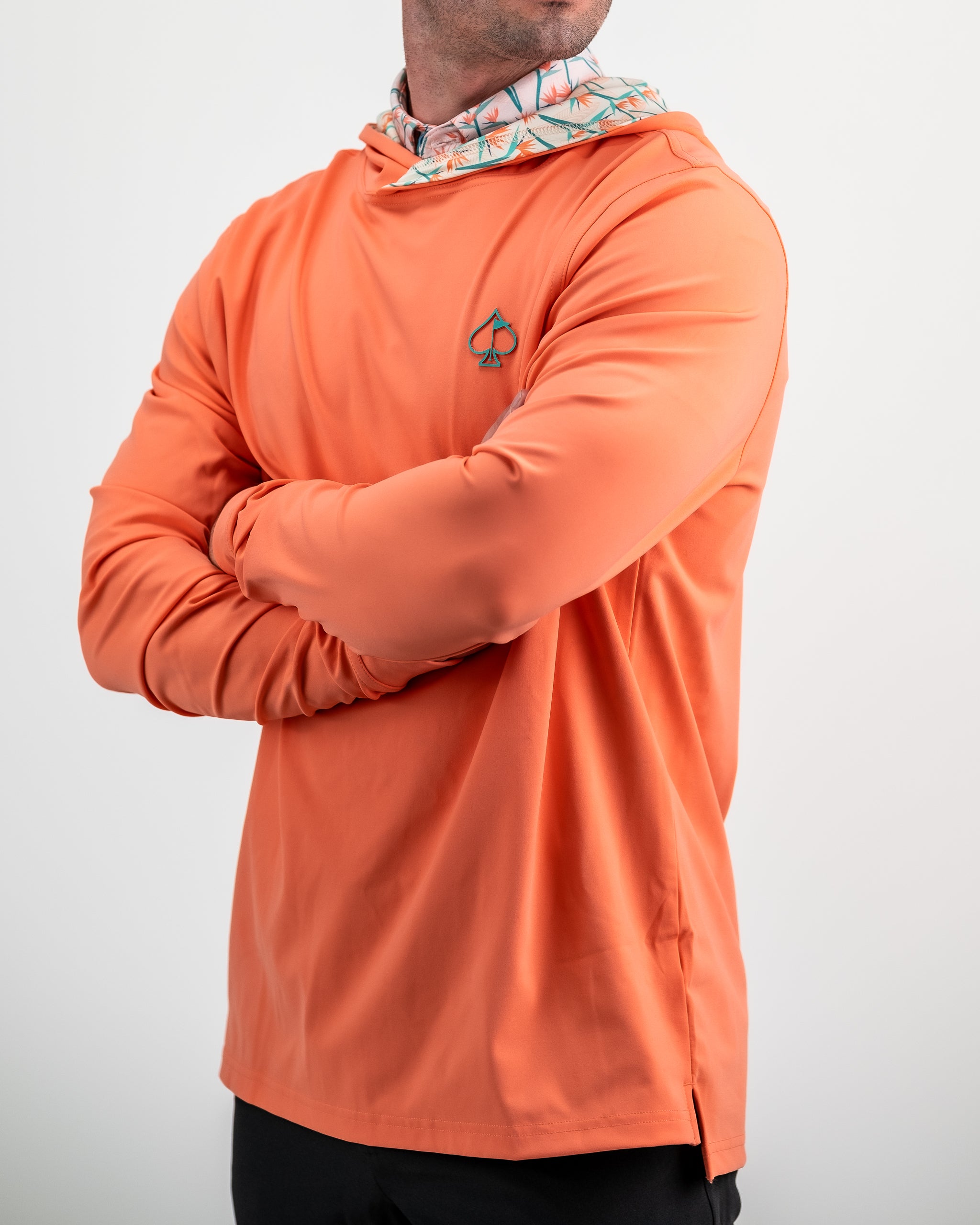 Performance Golf Hoodie in Birds of Paradise design featuring vibrant tropical colors and a comfortable fit.