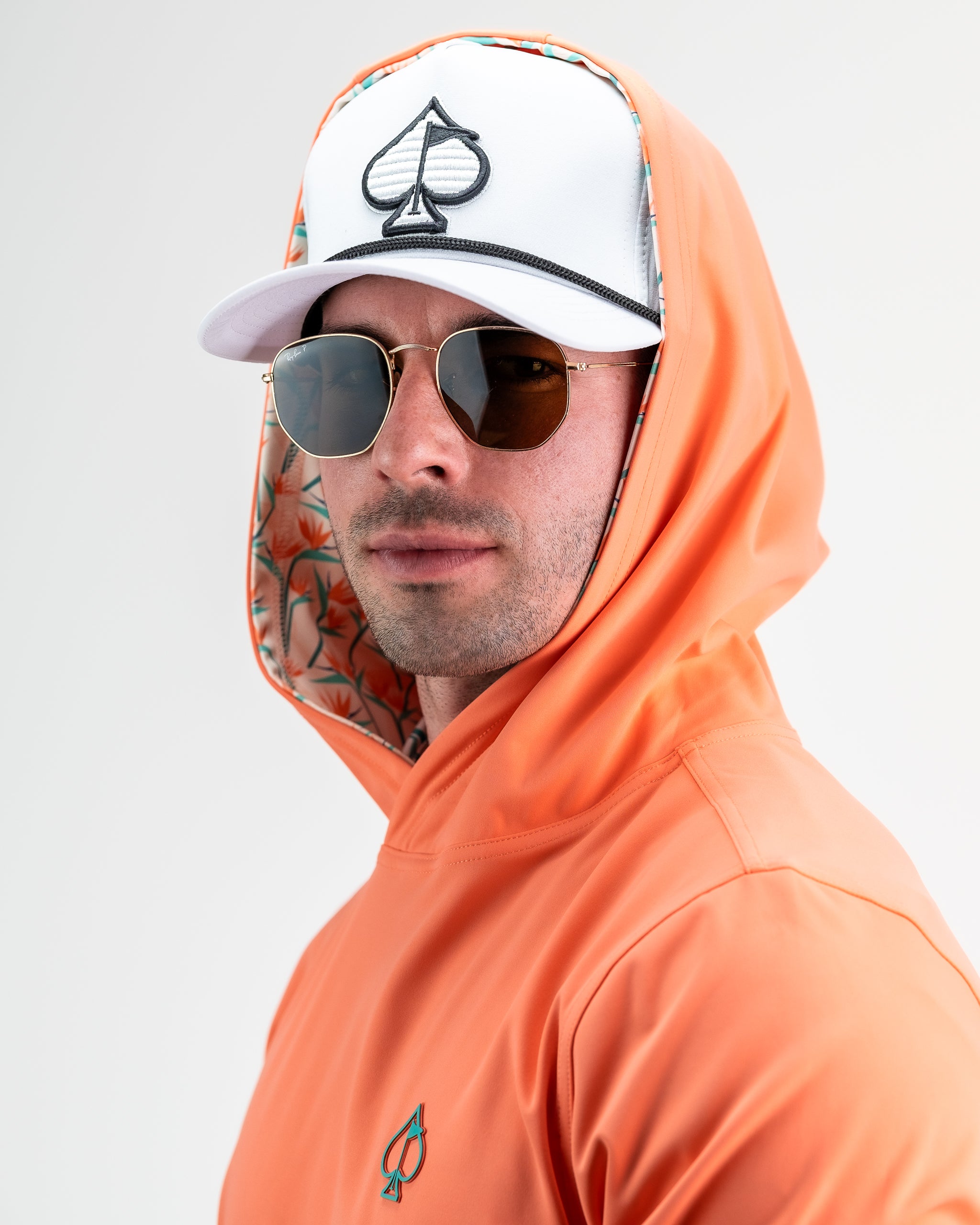 Performance Golf Hoodie featuring a vibrant Birds of Paradise print.