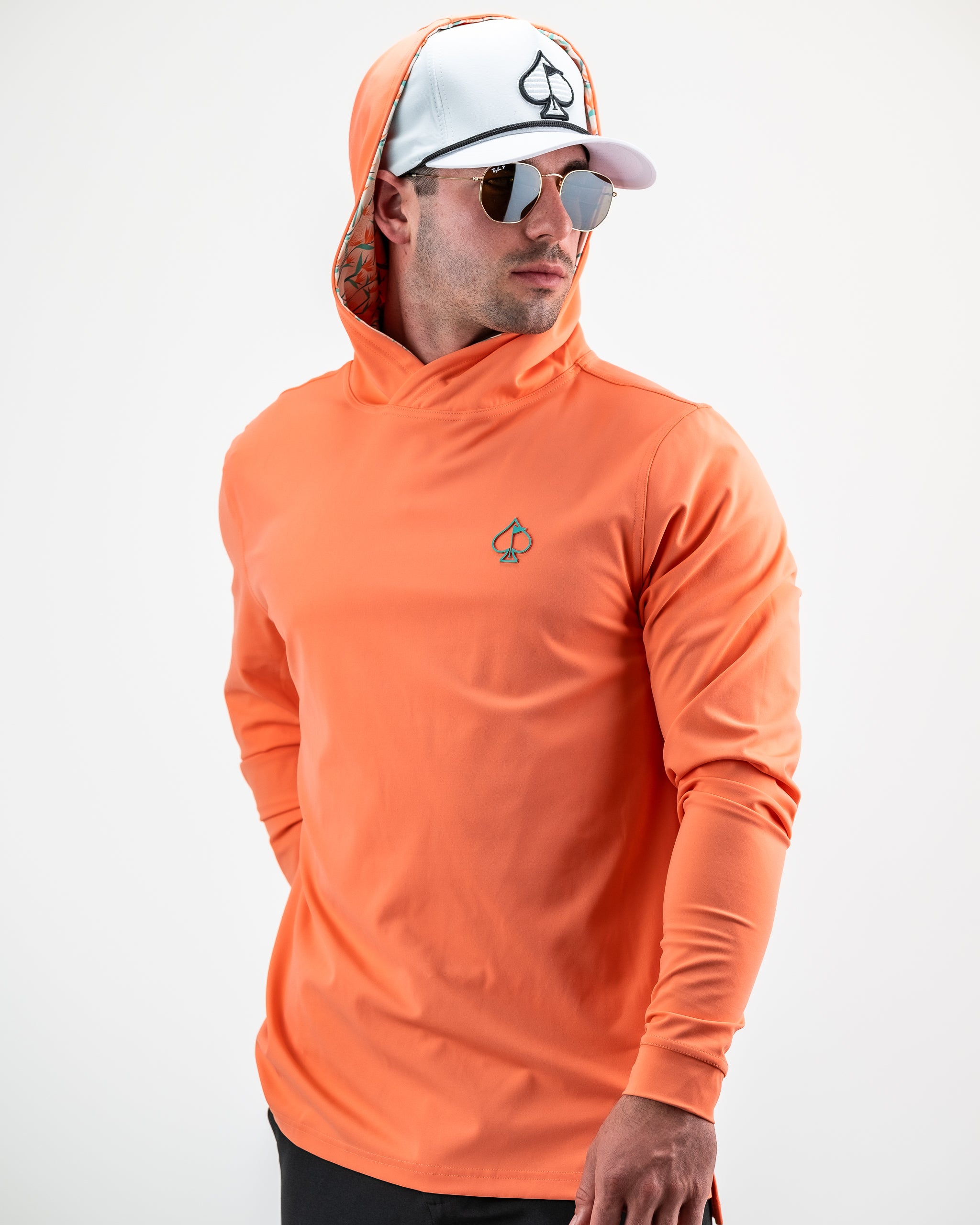 Performance Golf Hoodie in Birds of Paradise print featuring vibrant tropical colors and a sleek design.