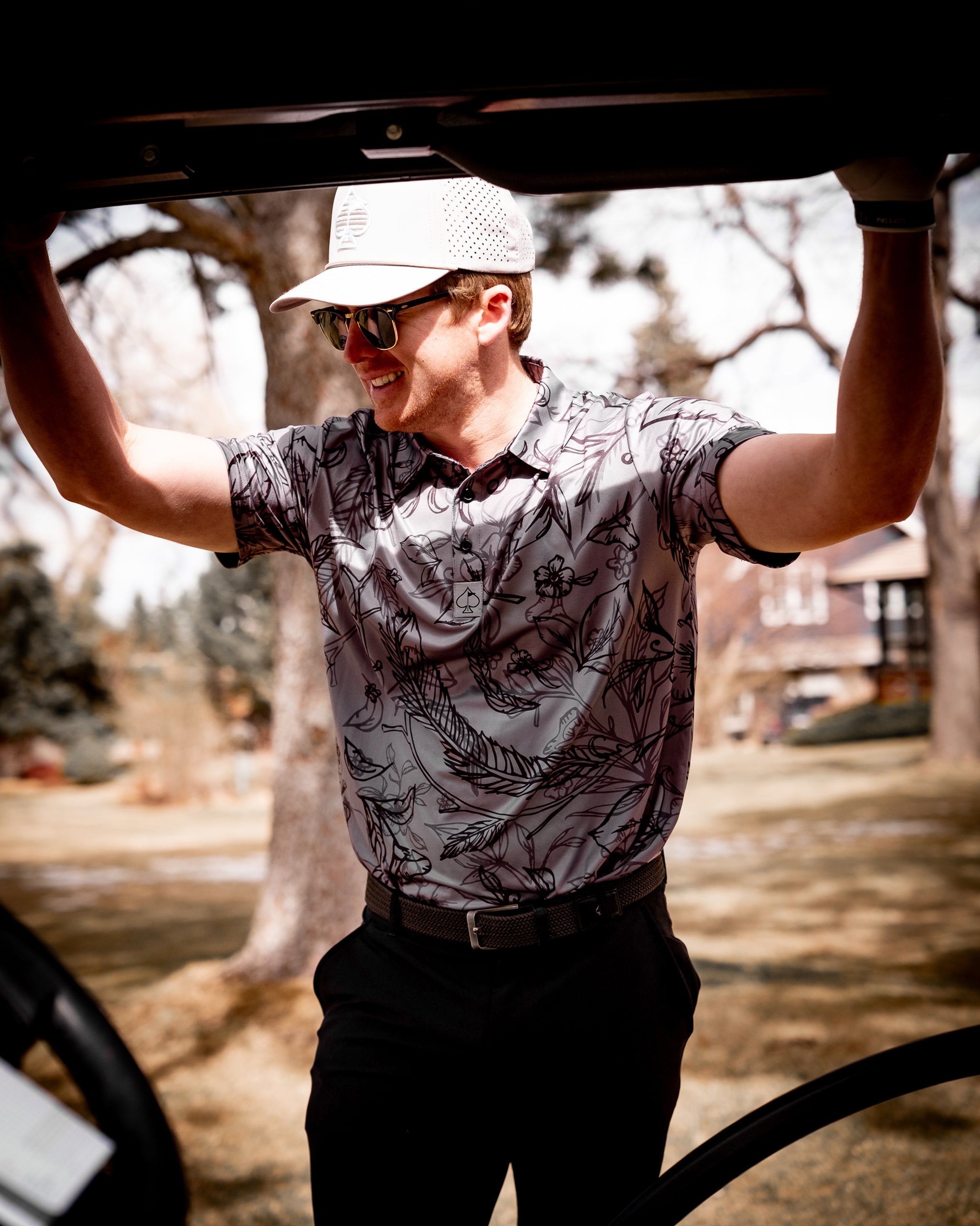 Cabo Midnight: Stylish black outdoor lounge chair with a modern design, set in a bright, sunny patio environment.