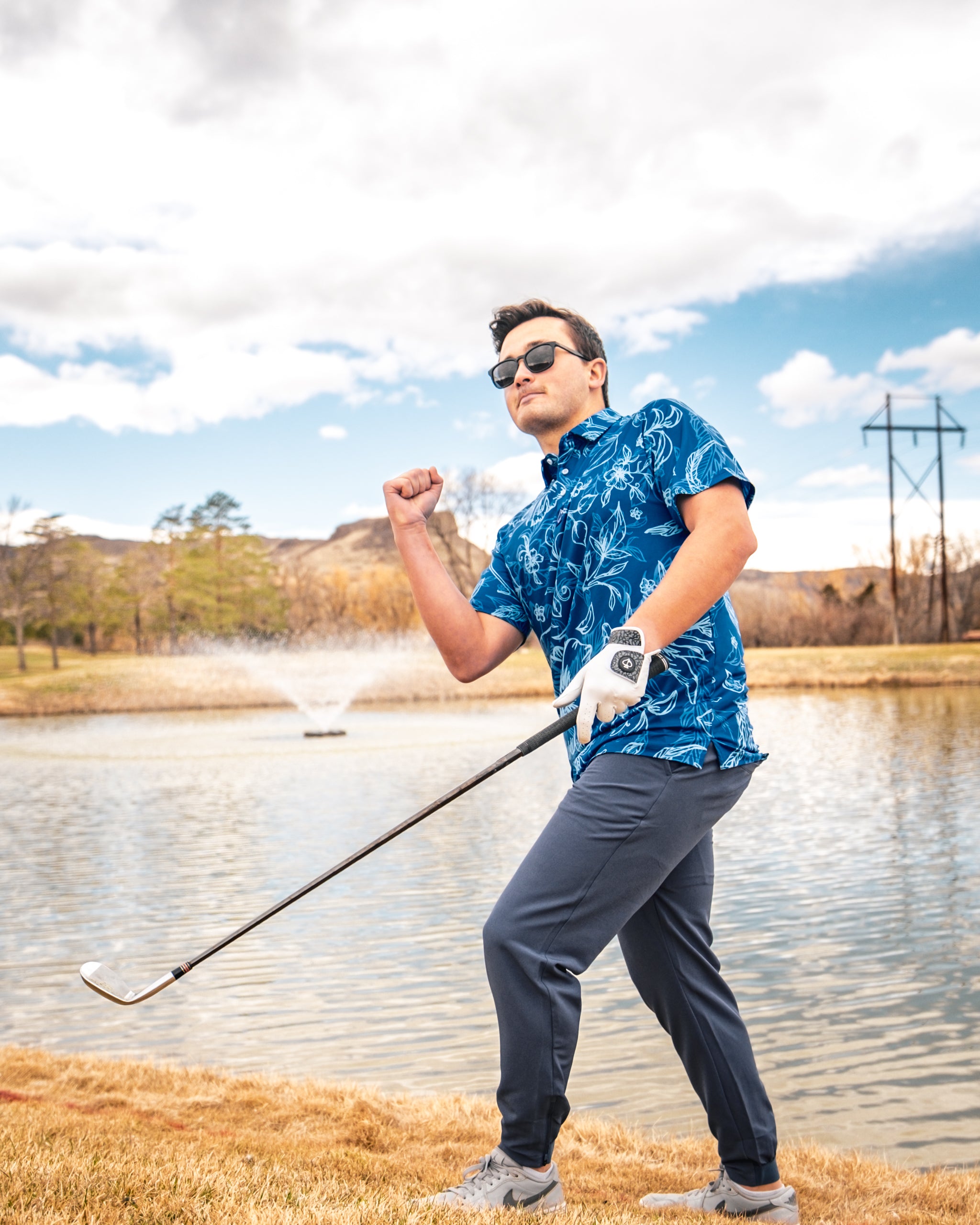 Cabo Ocean lifestyle image featuring a bright blue ocean, white sandy beach, and palm trees under a clear sky.