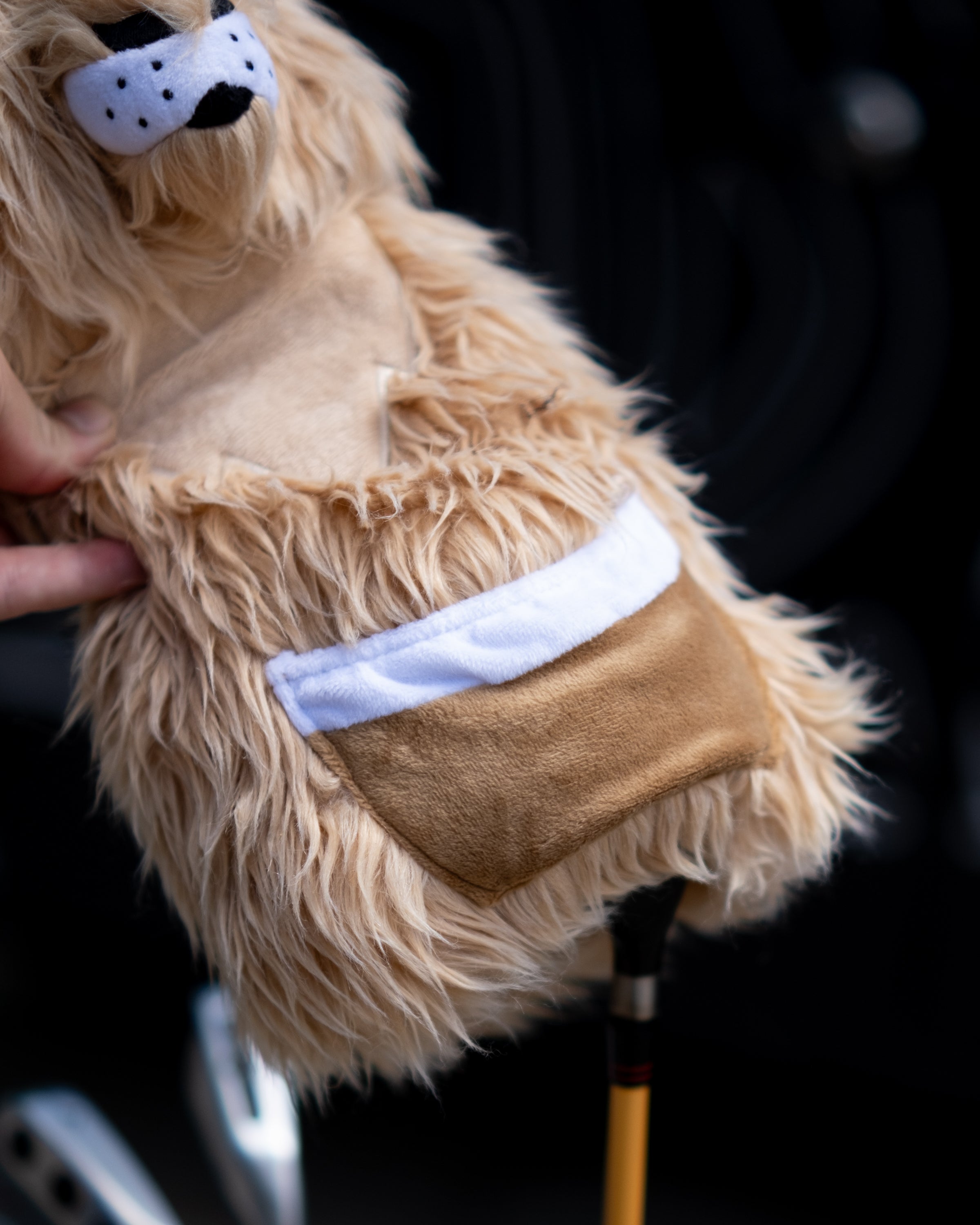 A plush kangaroo-themed driver cover with a furry exterior, white and brown fabric accents, designed to protect a golf club.