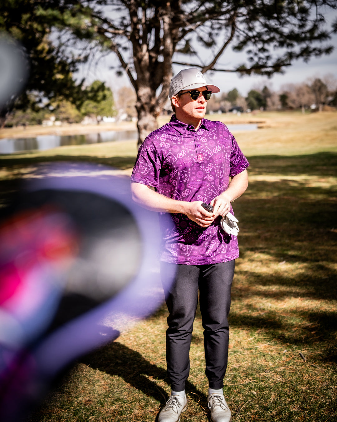Big Ace Purple backpack with multiple pockets and adjustable straps, displayed against a vibrant background.