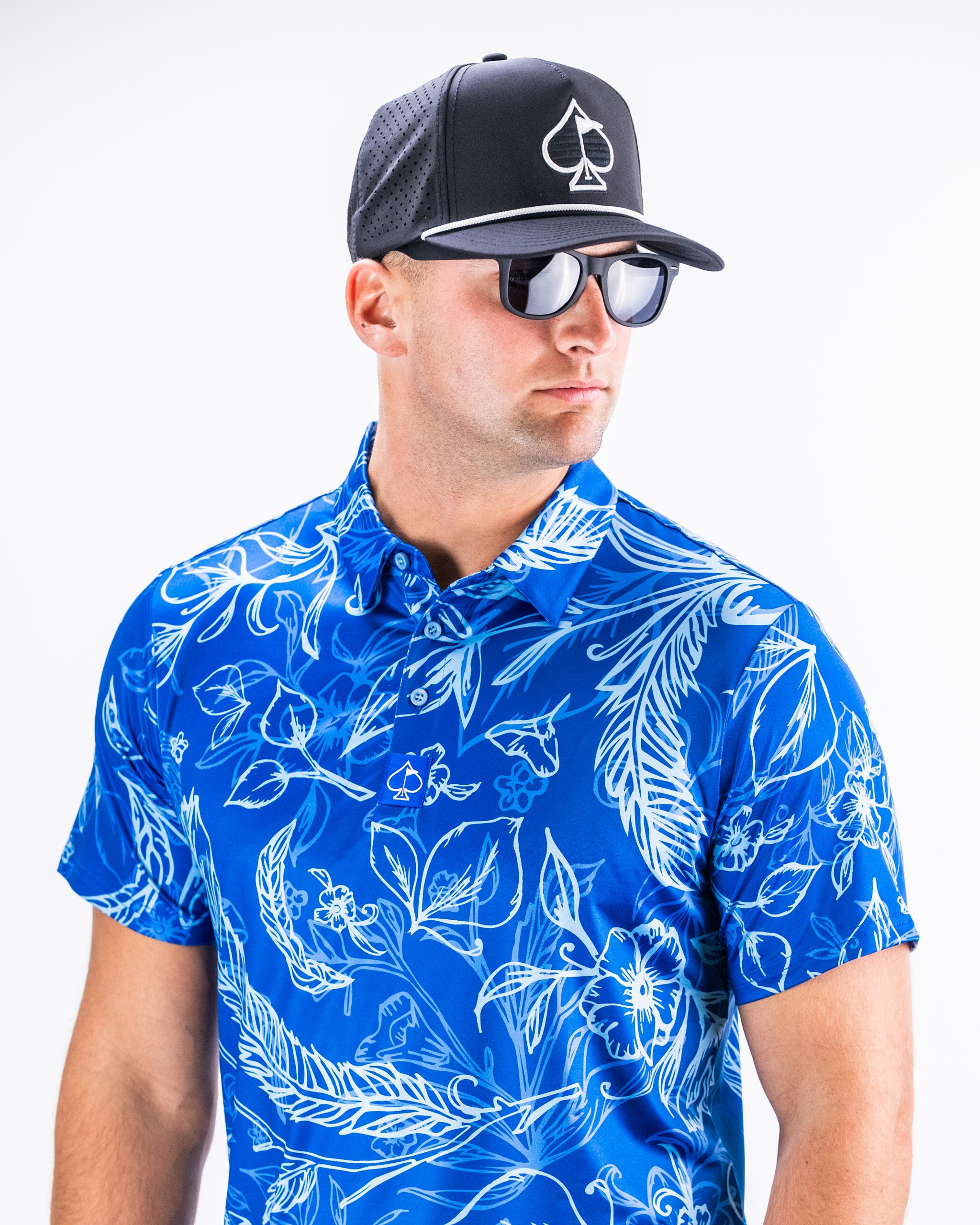 Cabo Ocean men's spring shirt in blue with tropical print.