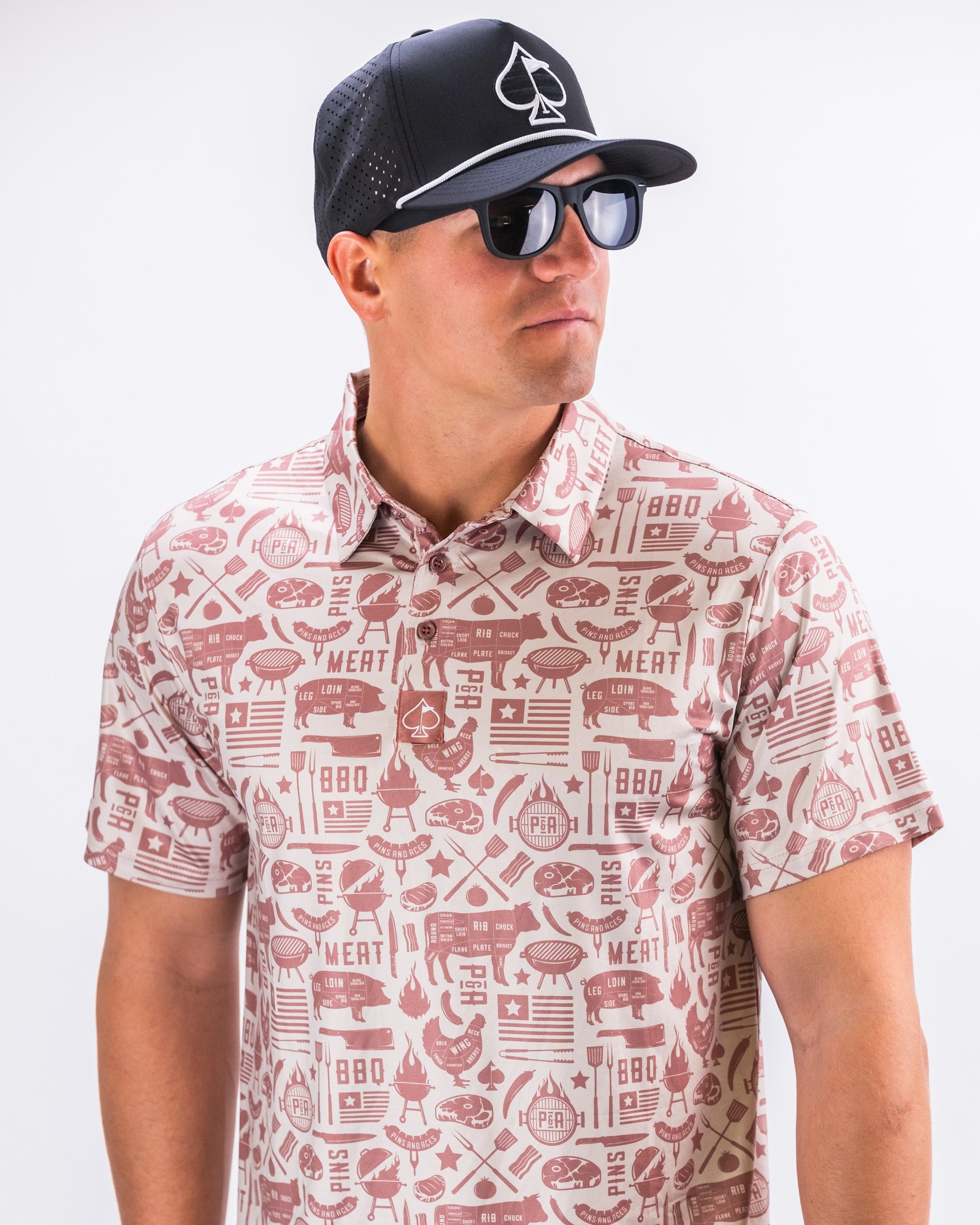 "Men's Pitmaster shirt in a vibrant plaid pattern, showcasing a classic button-up design with a collar and short sleeves."