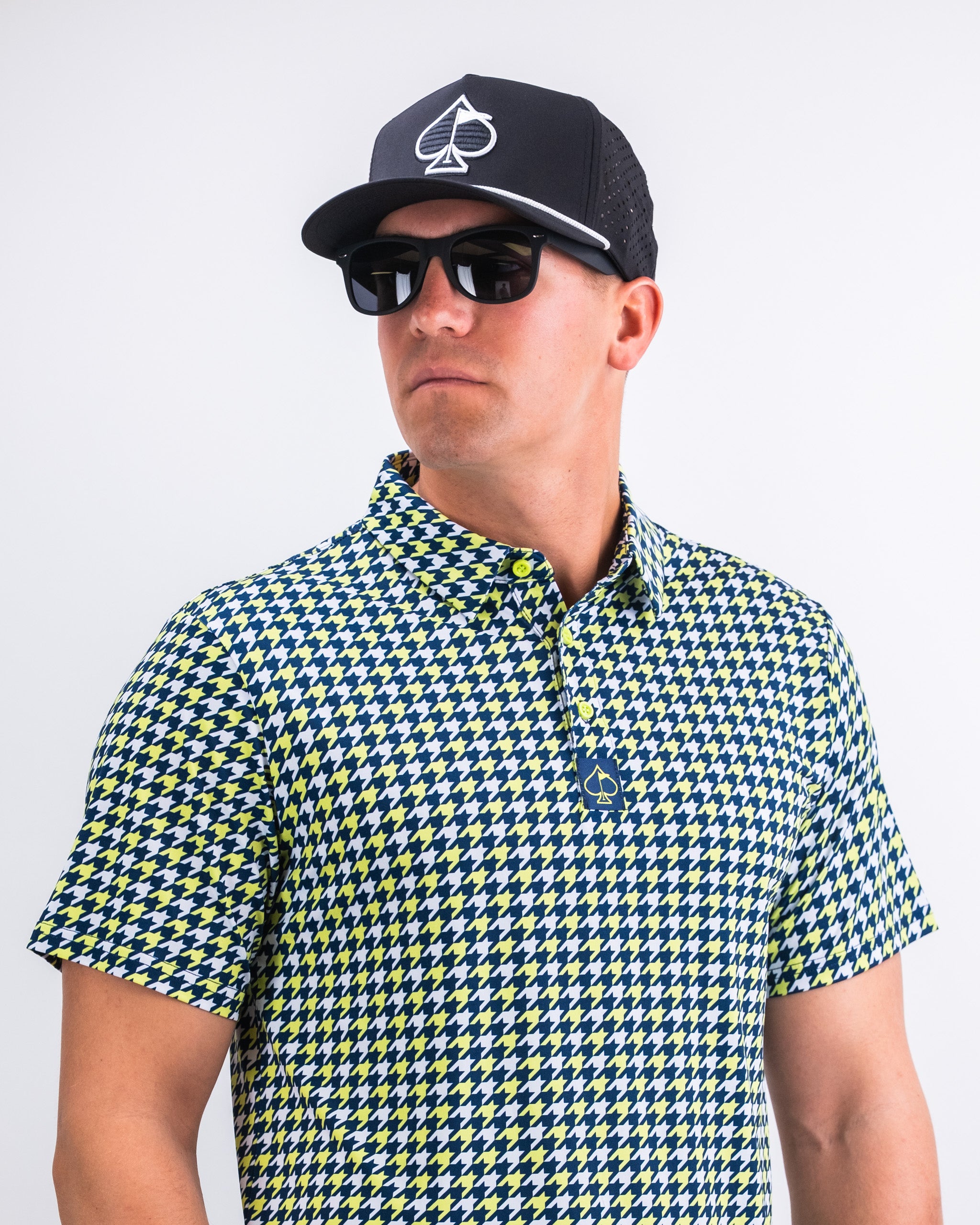 Houndstooth pattern shirt in lime green with black accents, showcasing a modern design and relaxed fit.