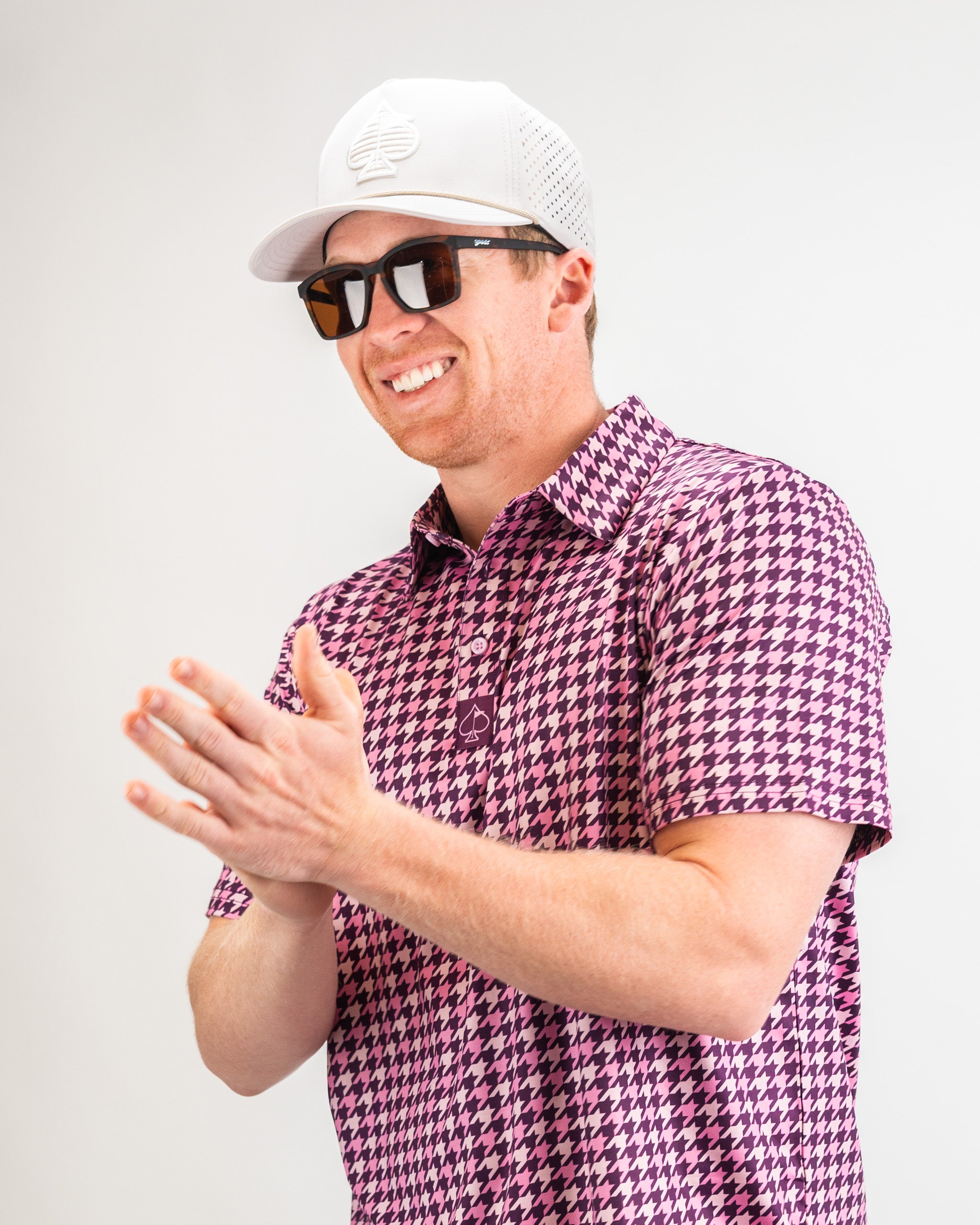 Men's houndstooth patterned shirt in raspberry color, featuring a modern fit and button-down collar.