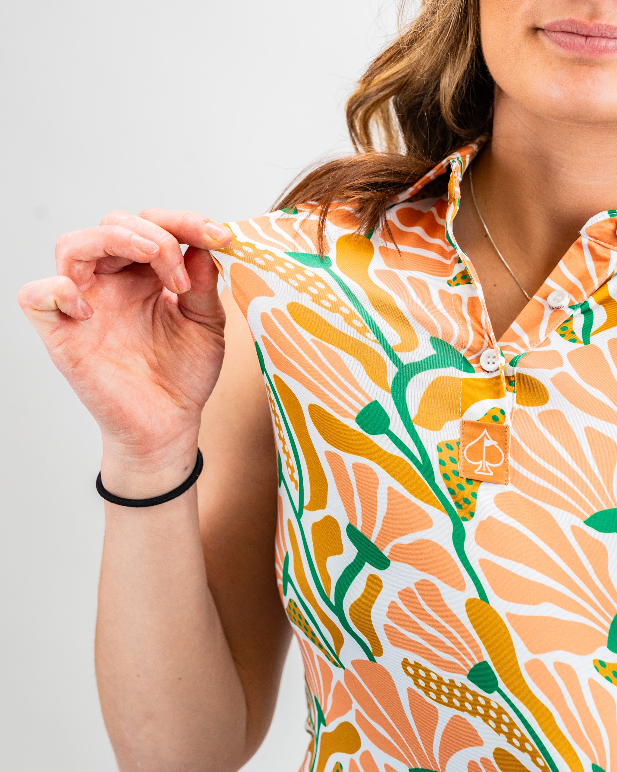 Women's Garden Party Spritz dress, featuring a colorful floral print on a light background, perfect for spring occasions.