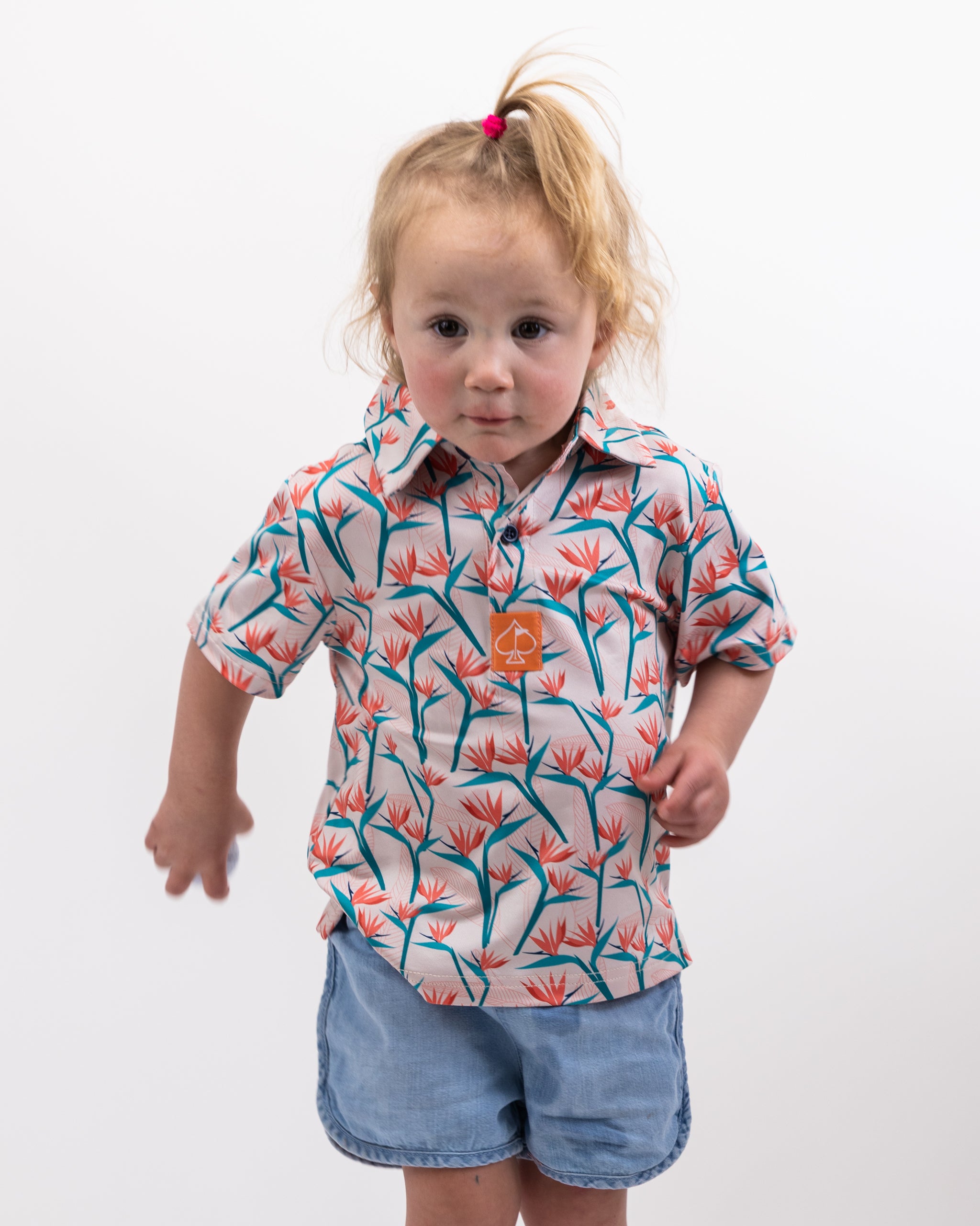 Youth Birds of Paradise outfit featuring vibrant tropical prints, perfect for spring fashion.
